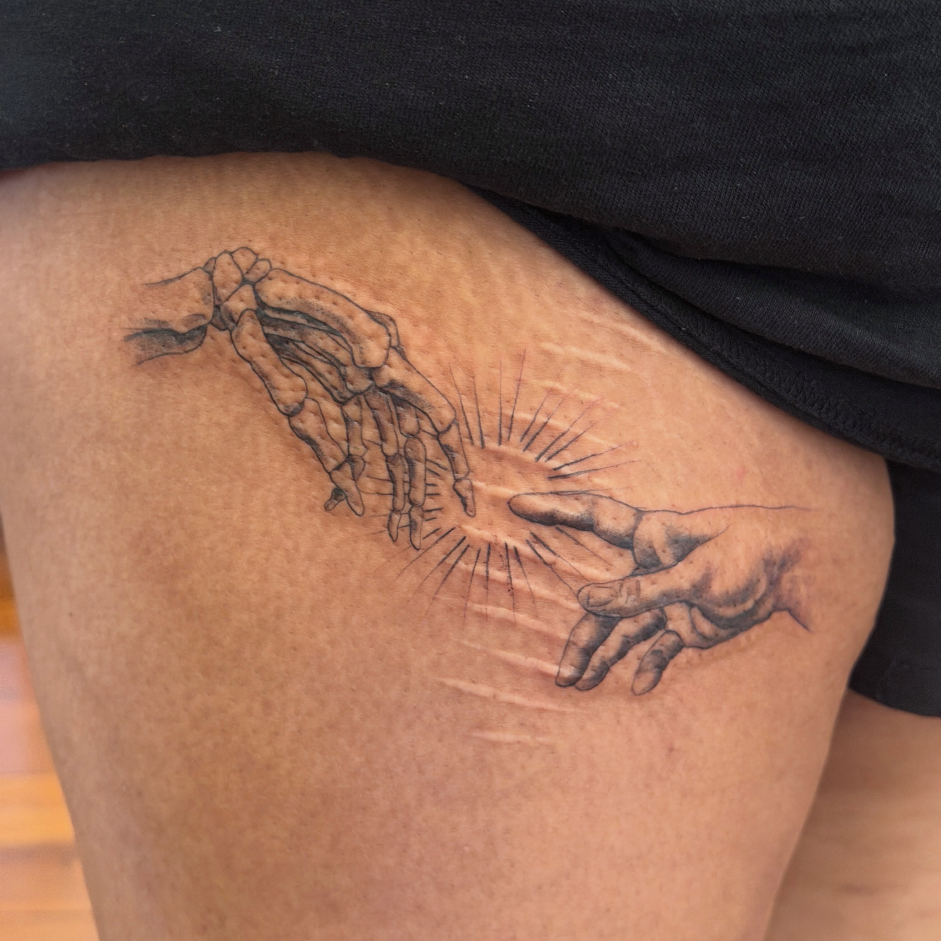 Creation scene realism tattoo on the thigh by Raul Najera Tattoo, Plano, Texas