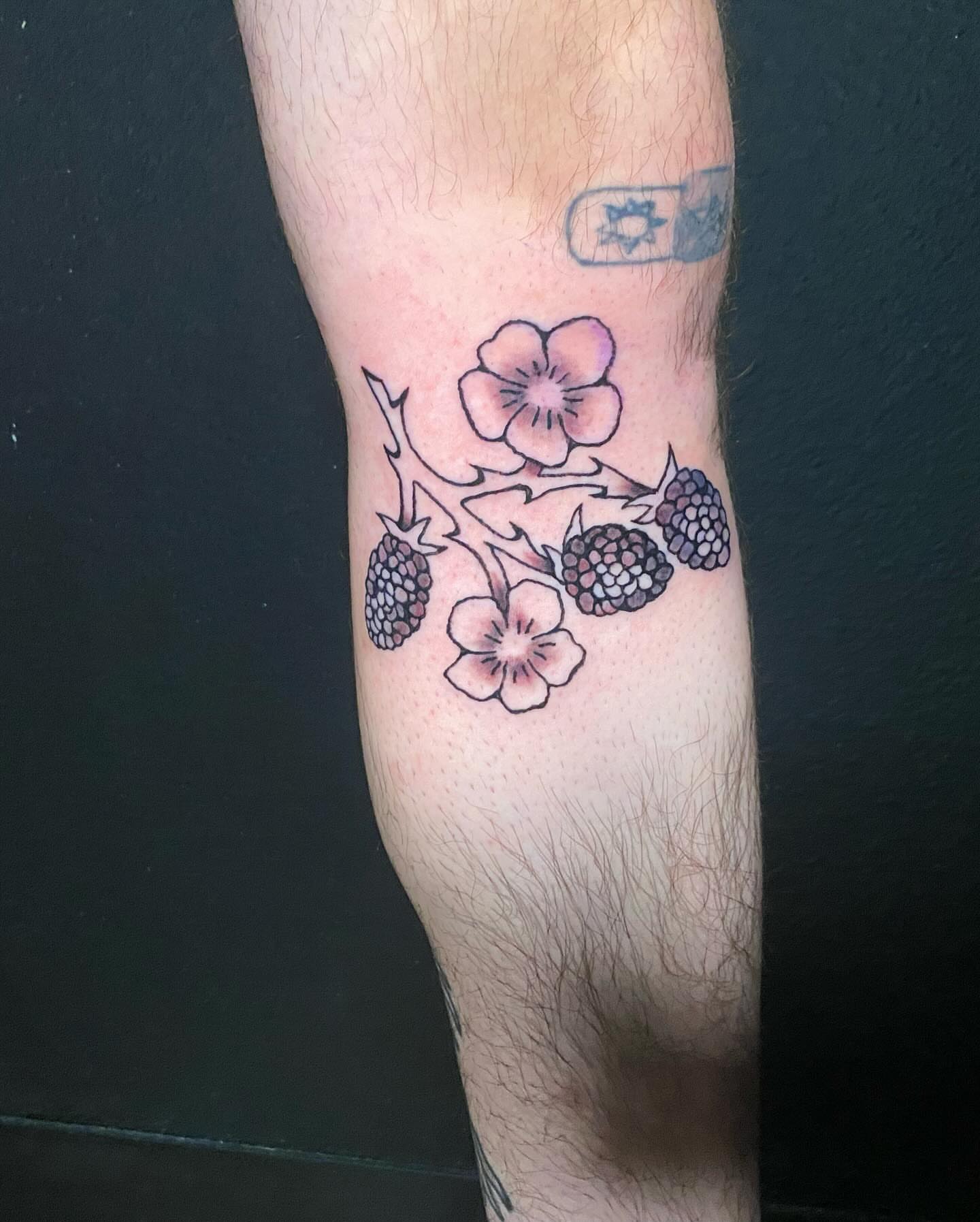 Cherry blossoms and berries dotwork tattoo on the forearm by ollie, Portland, Oregon