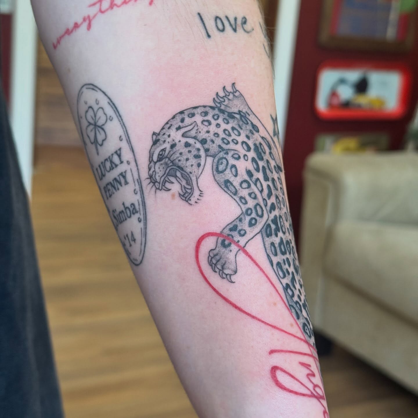 Leopard dotwork tattoo on the forearm by katie lou, Norwich, Connecticut