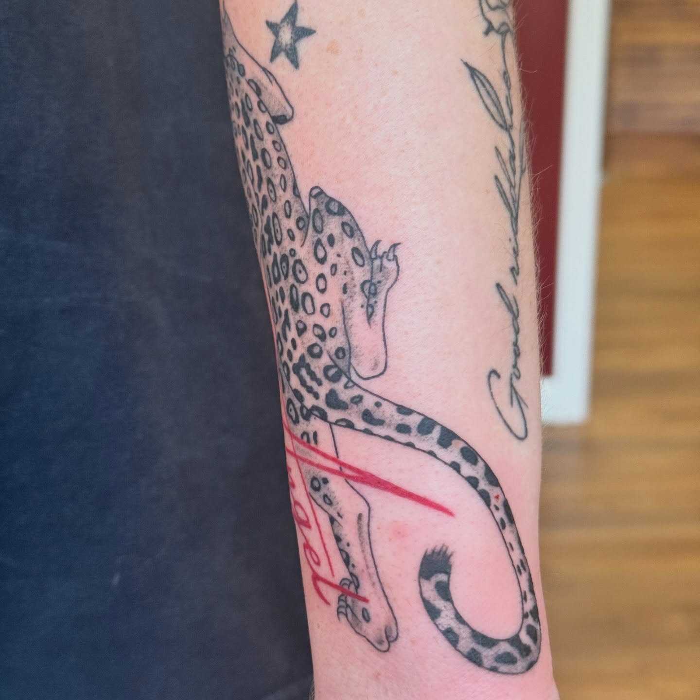 Leopard black and grey tattoo on the forearm by katie lou, Norwich, Connecticut