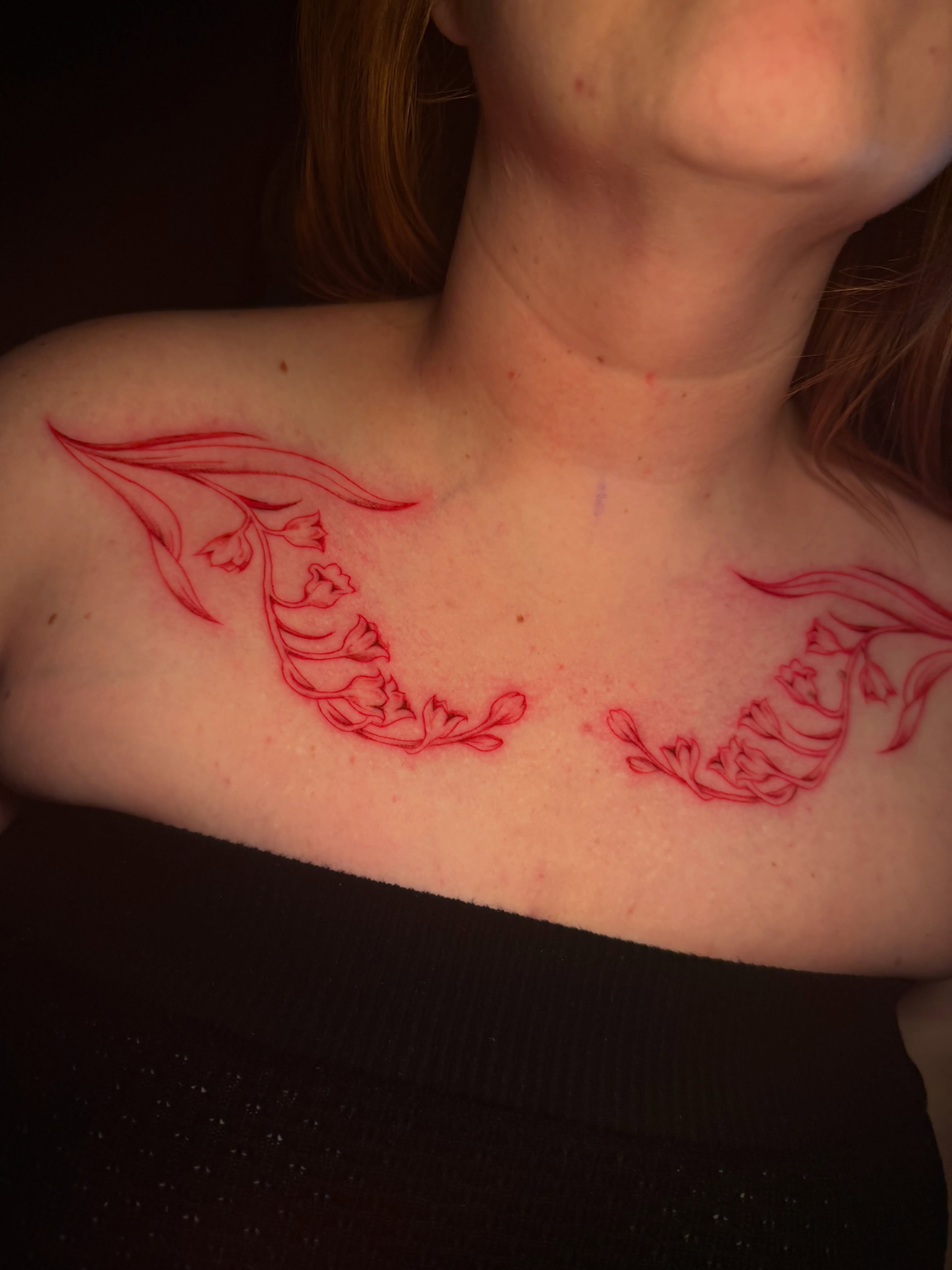 Lily of the valley fine line tattoo on the chest by tattoo artist (mollz)