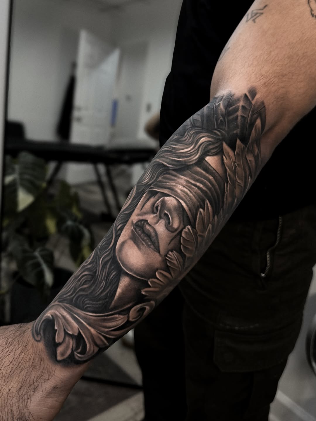 Tattoo by @rinktattoos — realism, black_and_grey