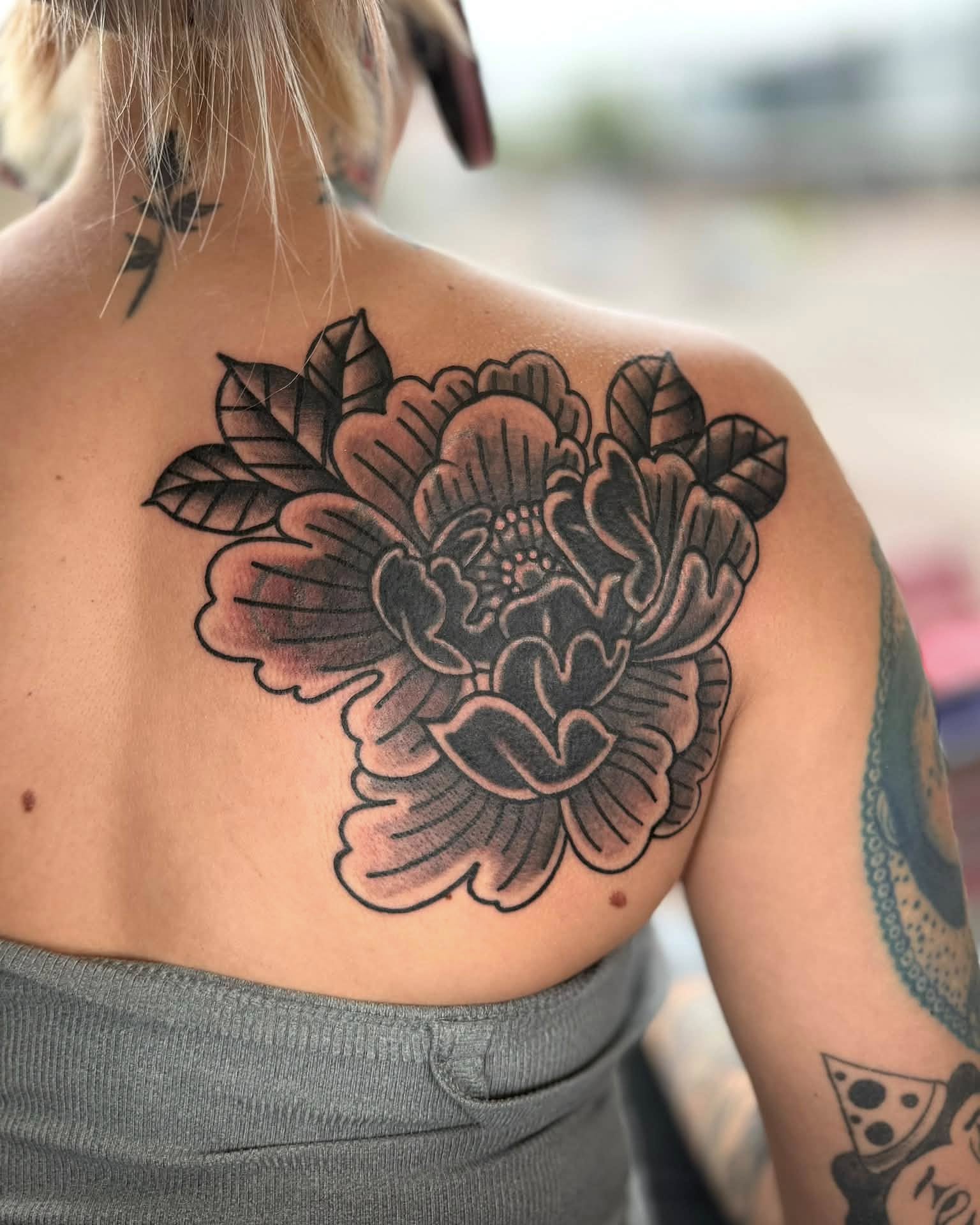 Flower black and grey tattoo on the shoulder by Eden Rose, Kalama, Washington