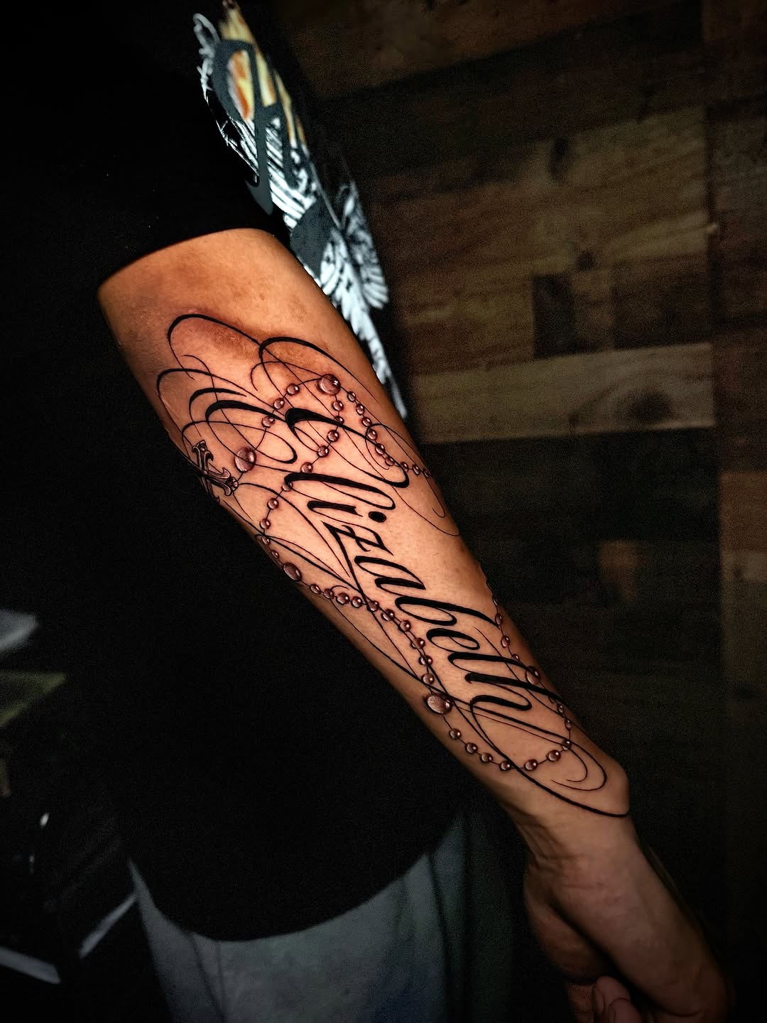 Tattoo by @screwhead_inkz — lettering_script, chicano