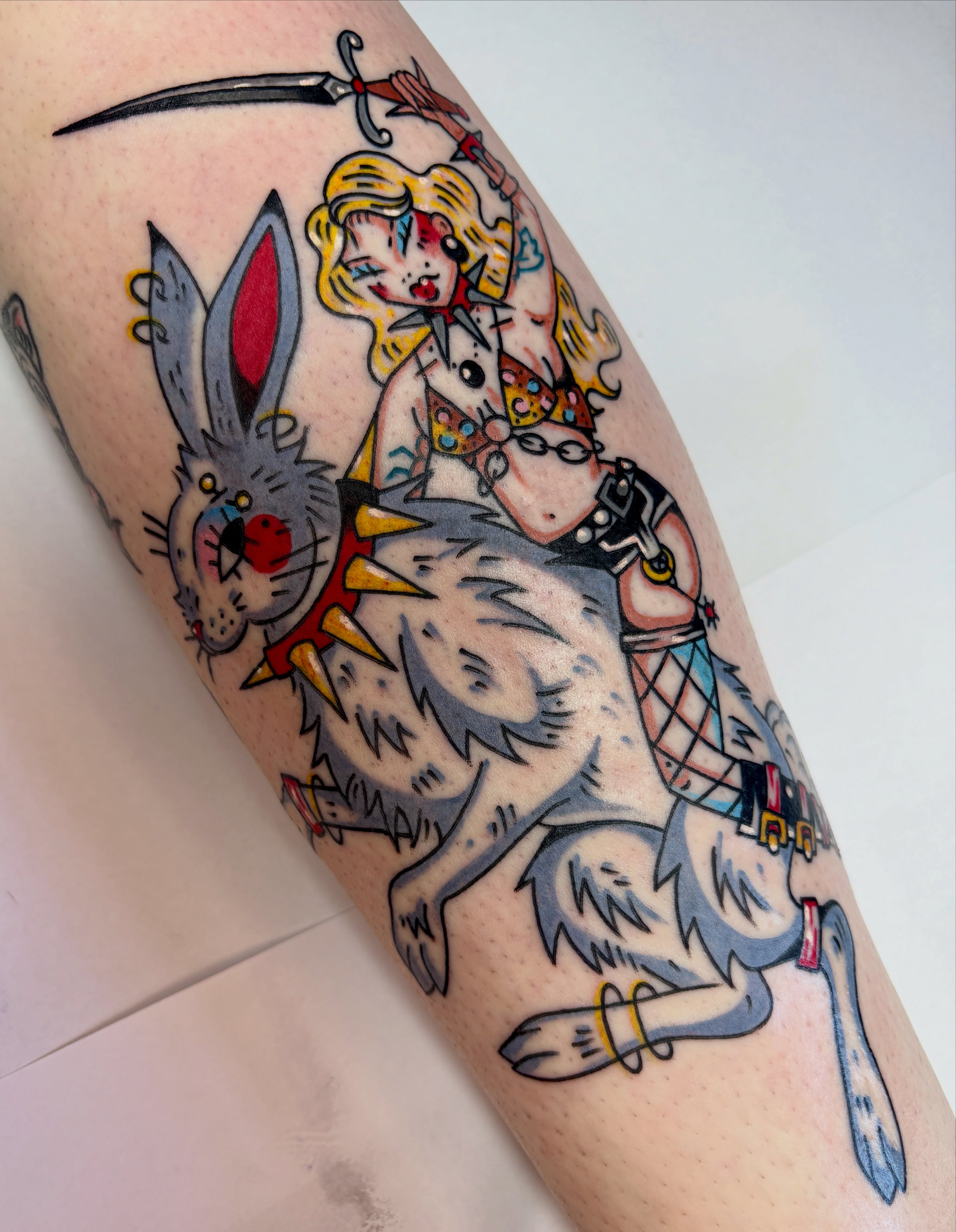 Rider and rabbit American traditional tattoo on the forearm by Bella