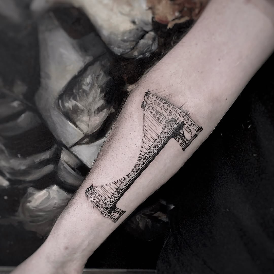 Suspension bridge sketch tattoo on the forearm by Yana Aizen