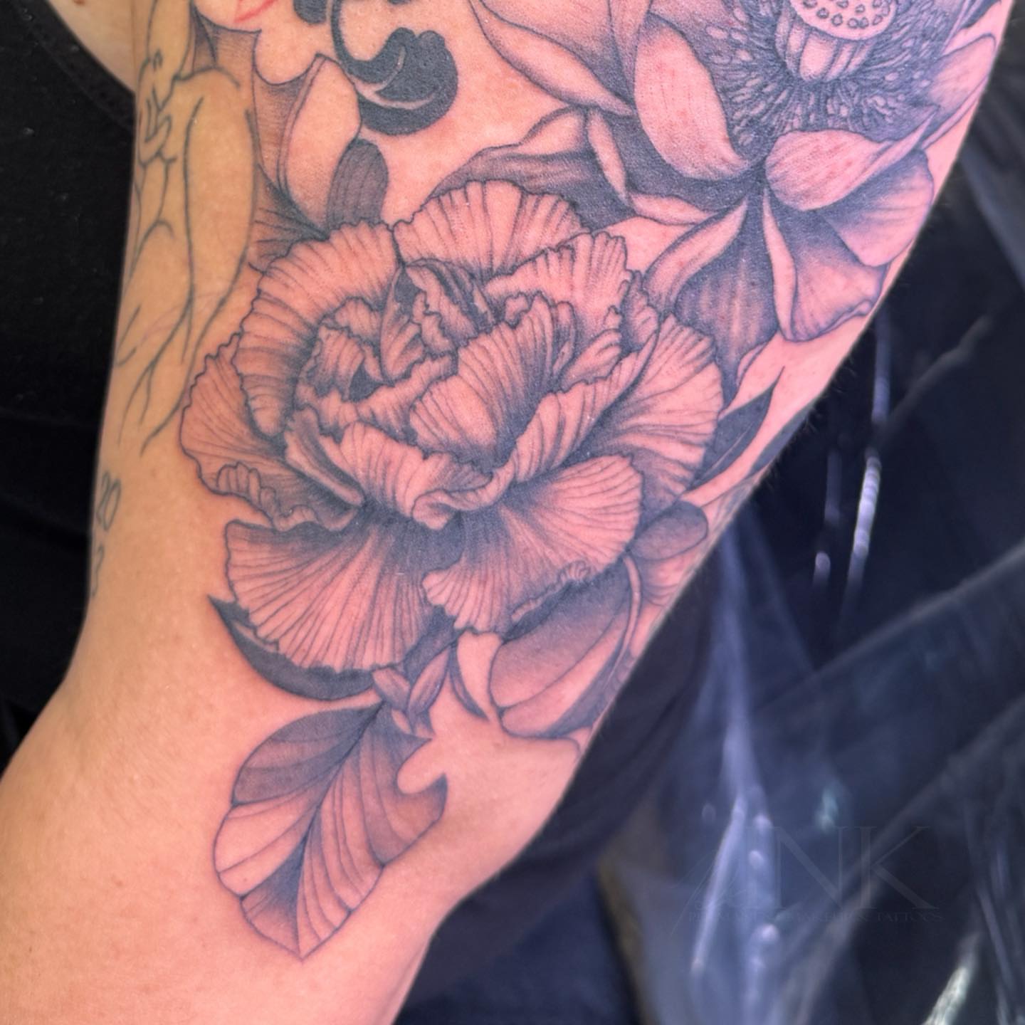 Peony realism tattoo on the forearm by PxINK, Crystal, Minnesota