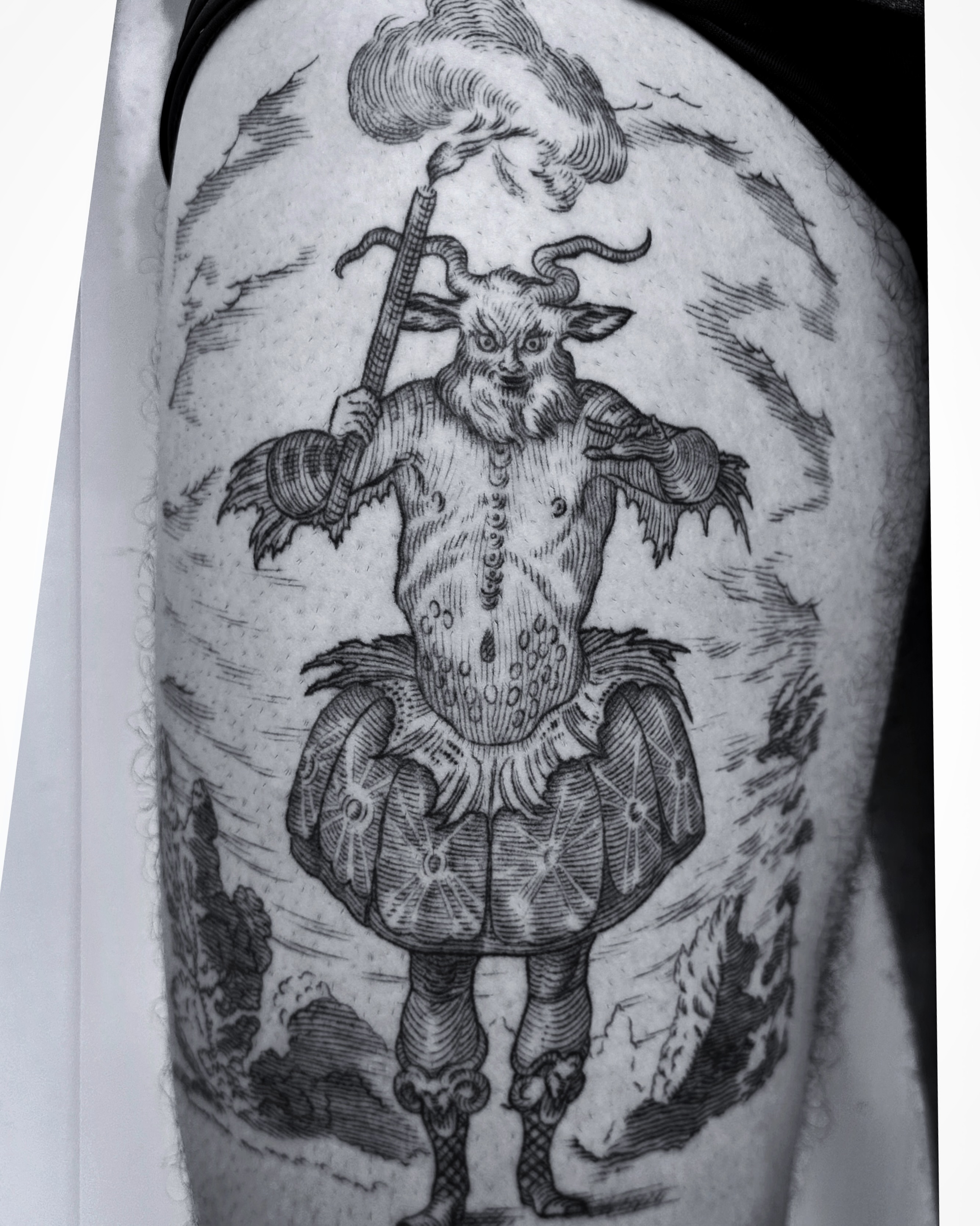 Goatman black and grey tattoo on the thigh by Jorge Nox