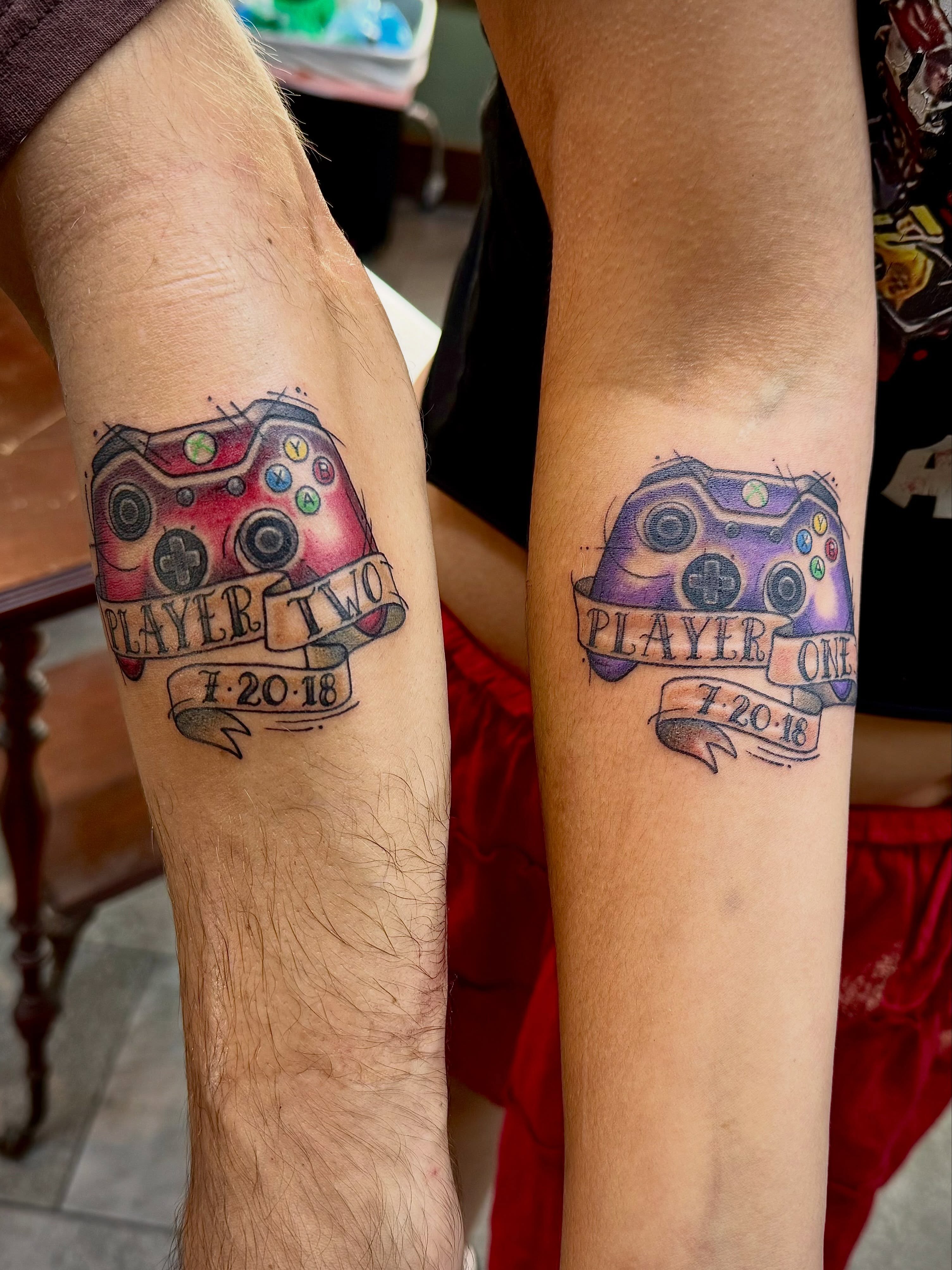 Video game controller dotwork tattoo on the forearm by Ashley Kayser