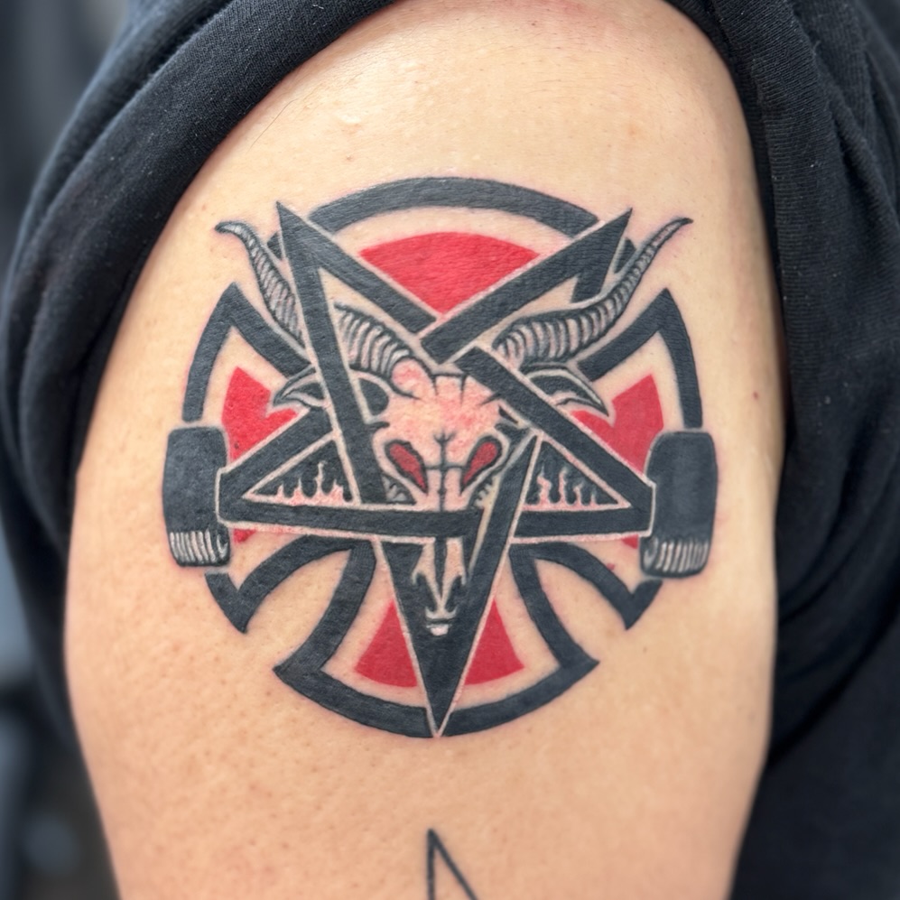 Pentagram with goat head American traditional tattoo on the shoulder by David