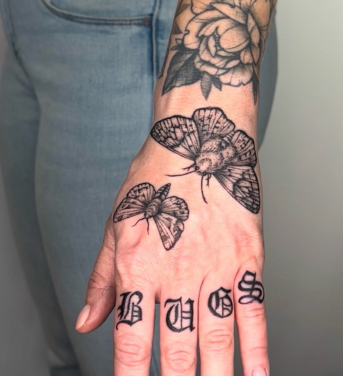 Butterfly and roses black and grey tattoo on the hand by ⚒dptattoos ⚒, East Williamsburg, Brooklyn
