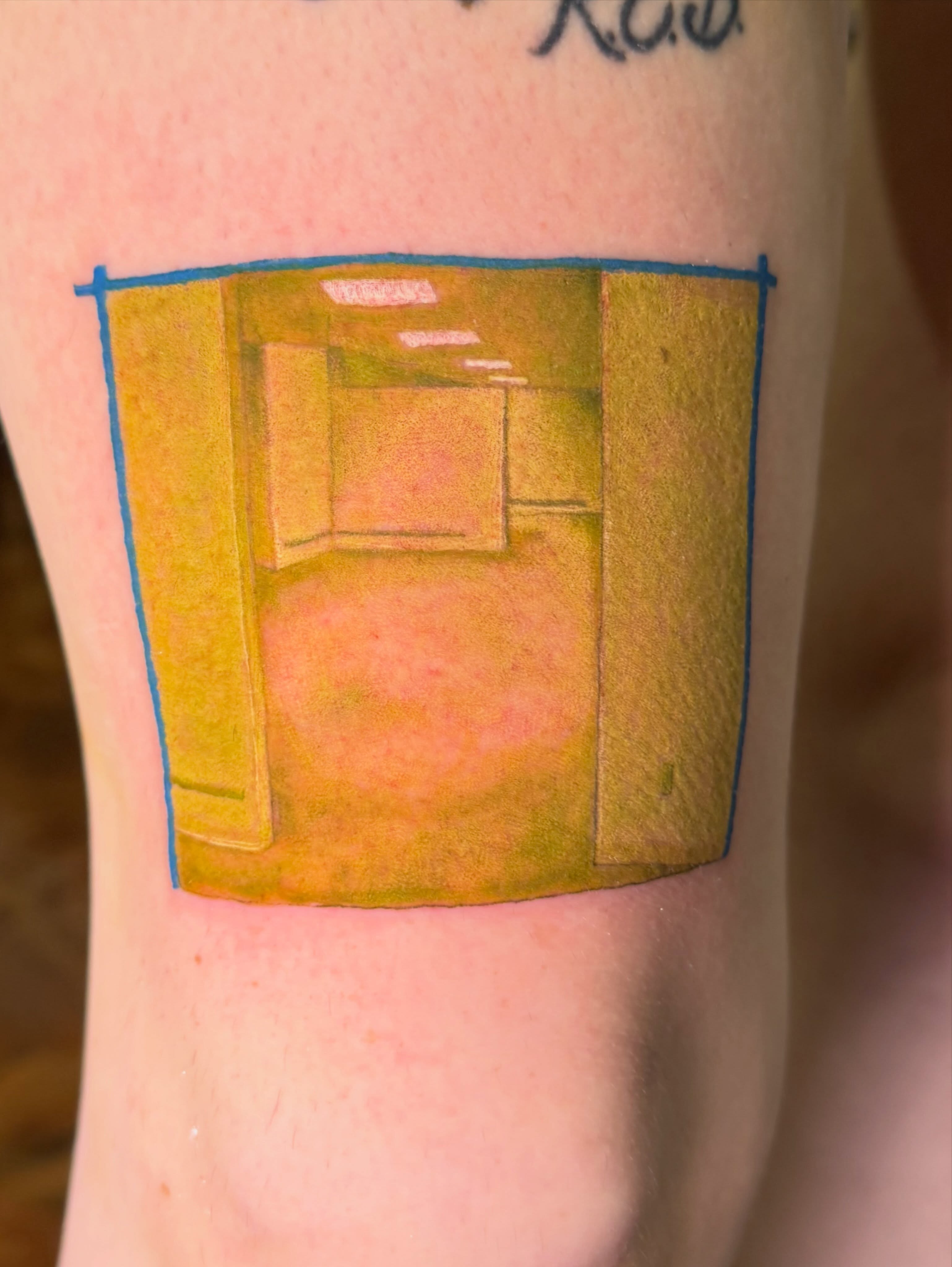 Floppy disk geometric tattoo on the forearm by Erin McDavis