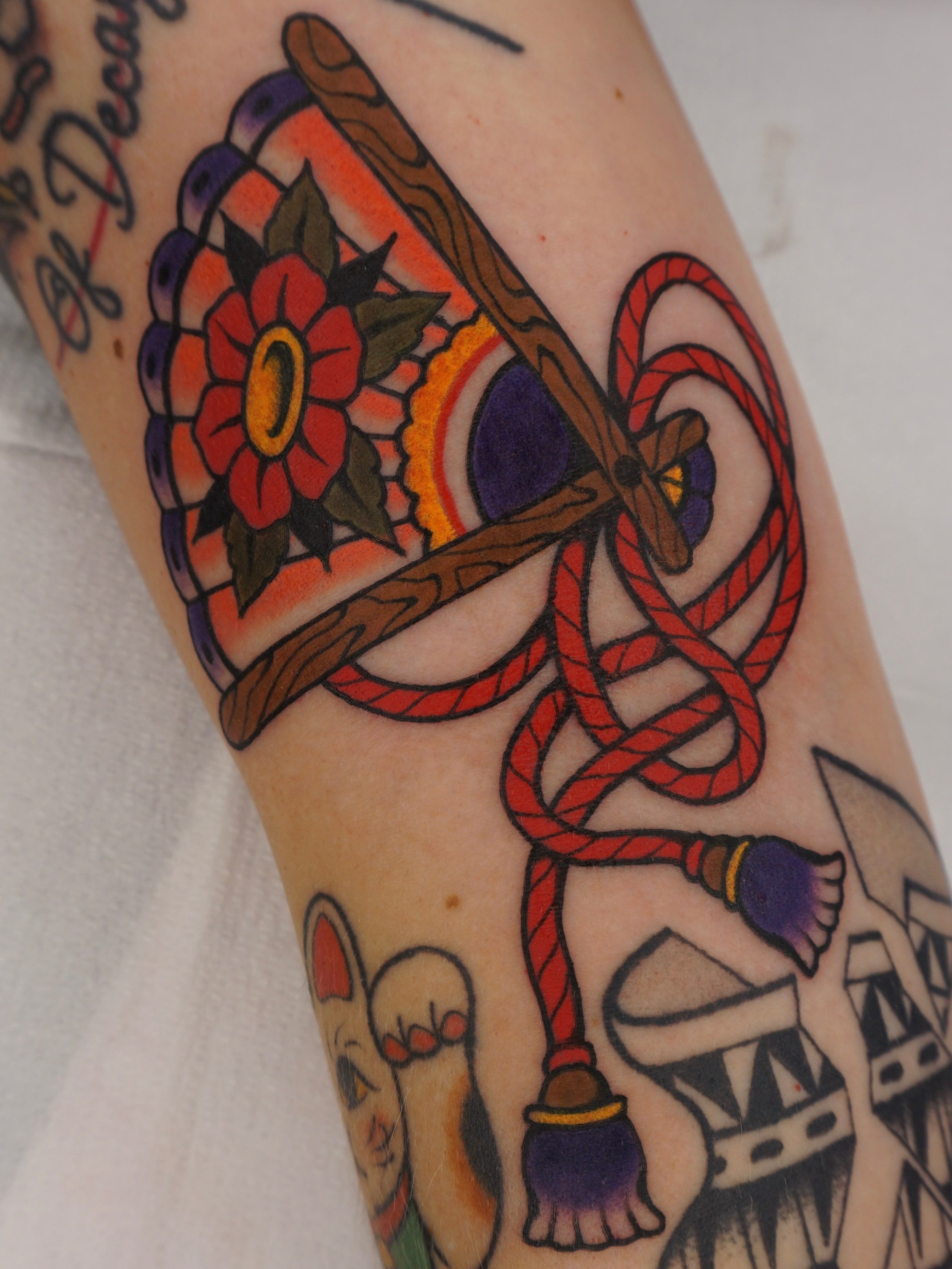 Flower pot and rope American traditional tattoo on the forearm by Sarah Christine Tattoo, Calgary, Alberta