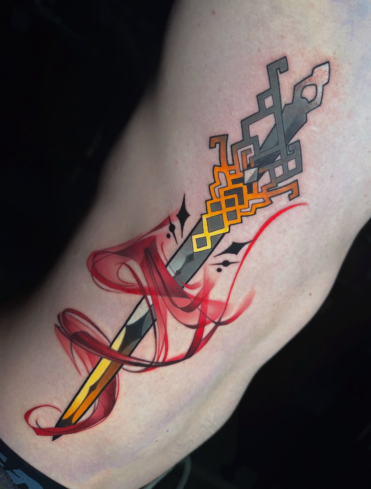 Sword and flame geometric tattoo on the forearm by Cheyenne Shoffner