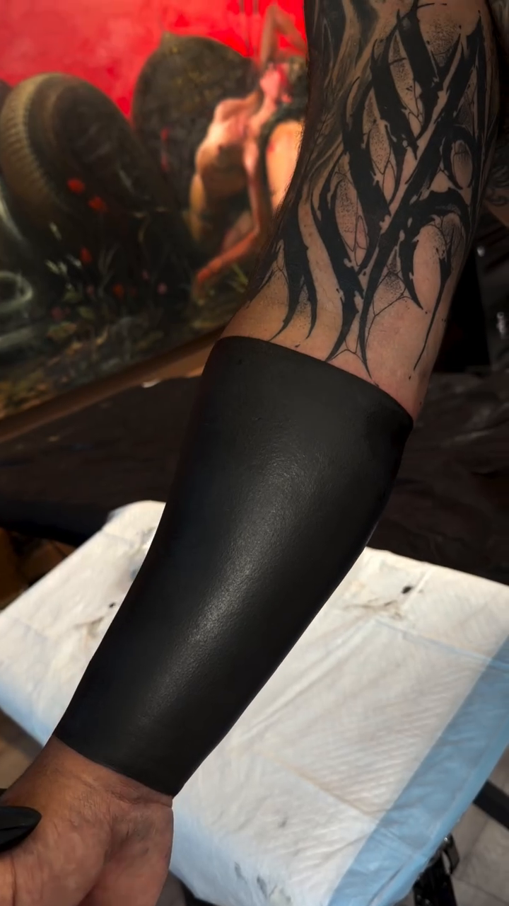 Blackout sleeve blackwork tattoo by Zlata