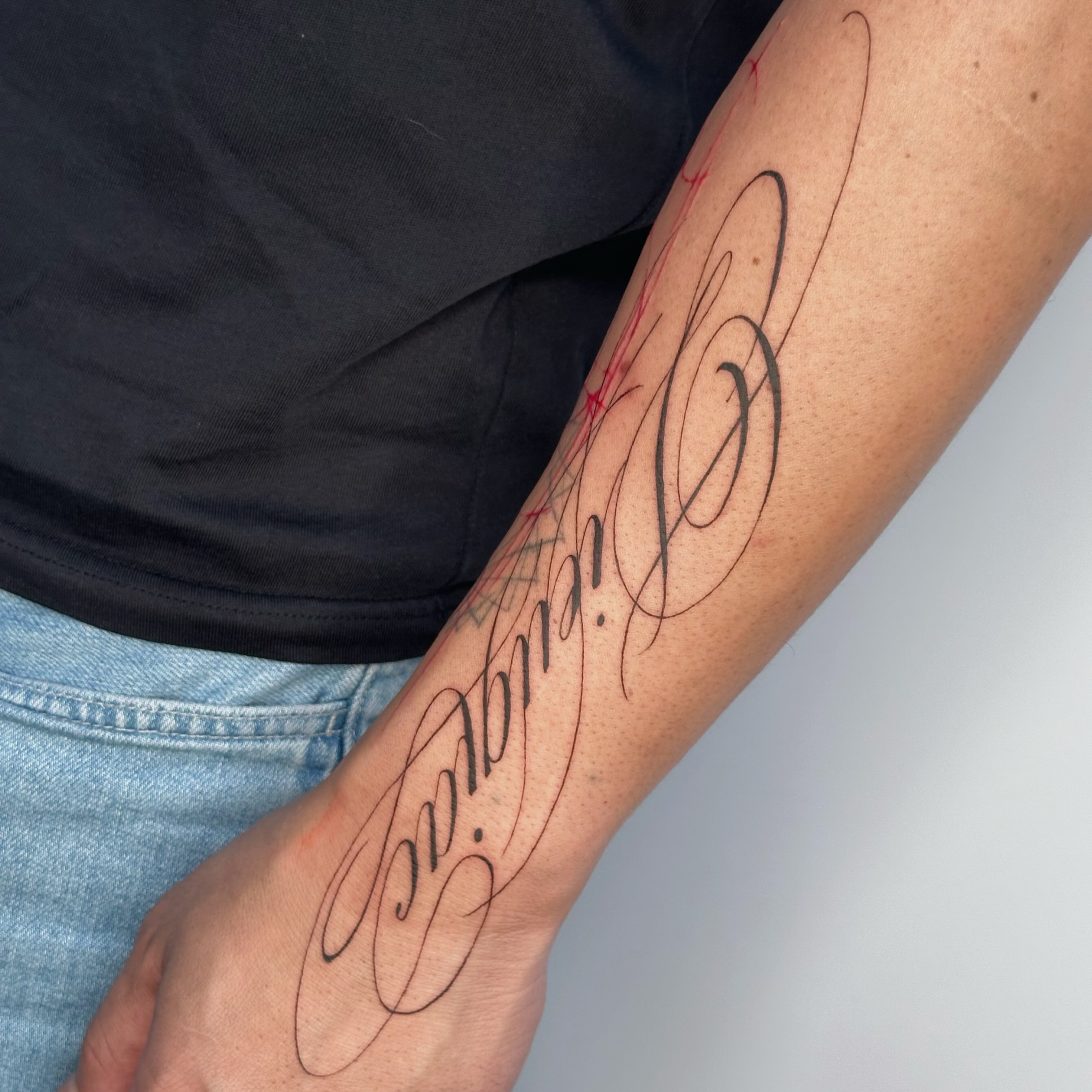 Tattoo by @livlaughtats — lettering_script