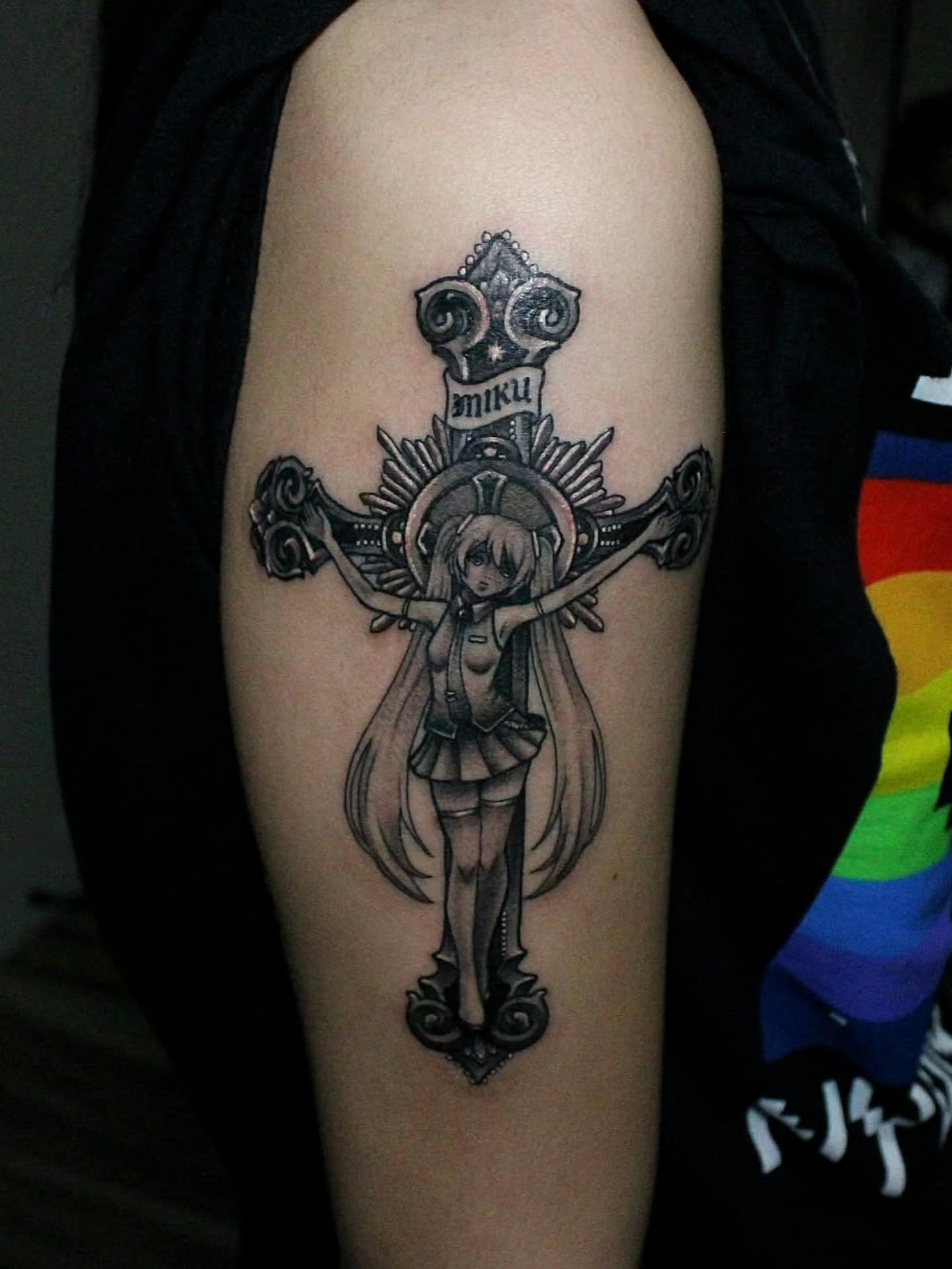 Cross with anime character anime tattoo on the forearm by Joey Vinci, Phoenix, Arizona