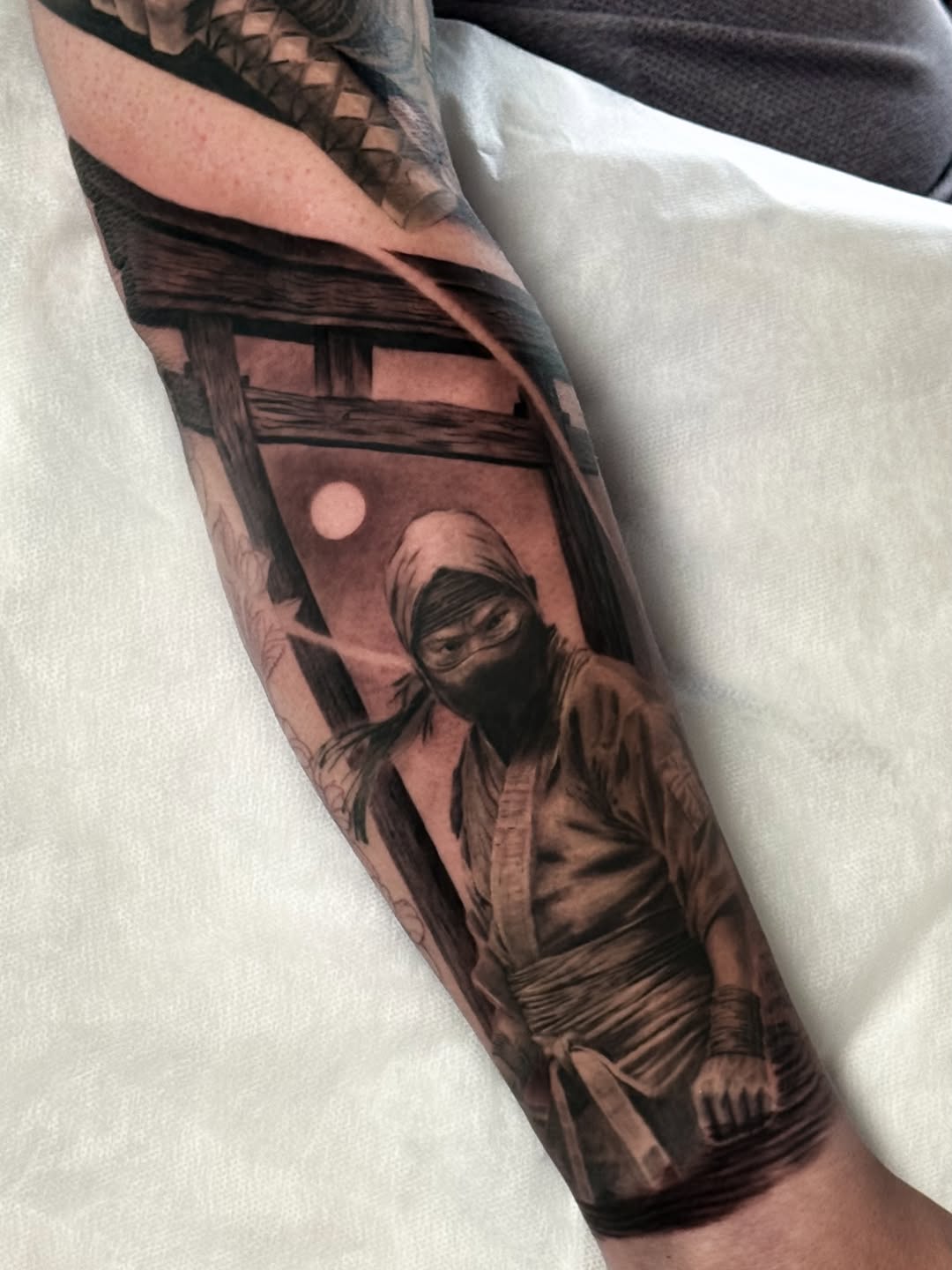 Tattoo by @irena.tattooing — realism, black_and_grey
