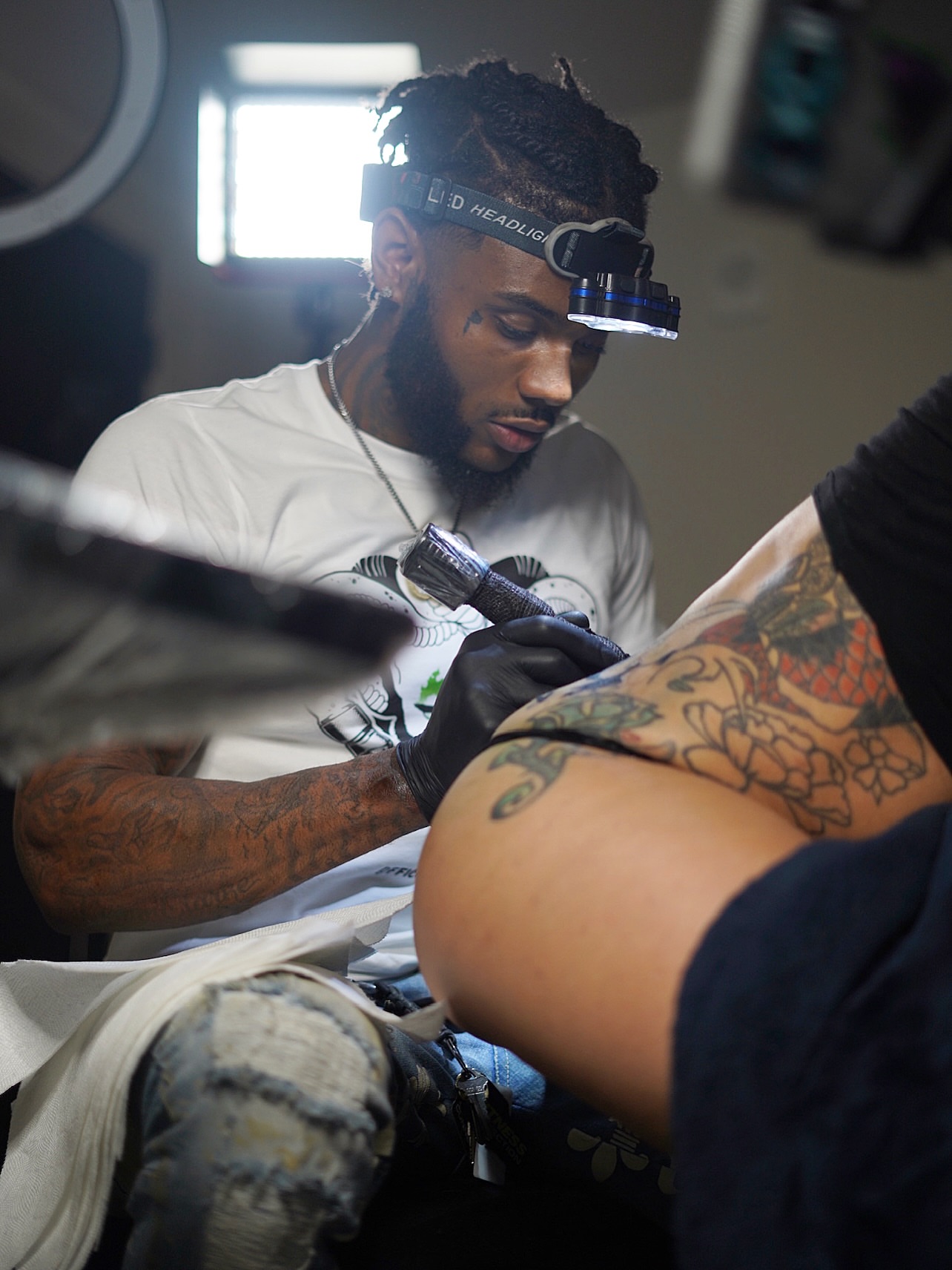 Floral design new school tattoo on the thigh by Deonte Dwayne Durham