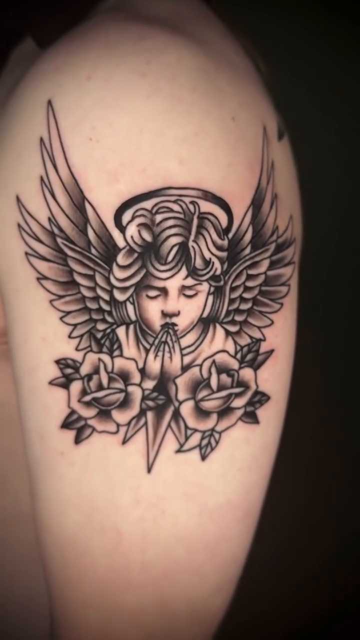 Angel with roses neo-traditional tattoo by Terence Taylor