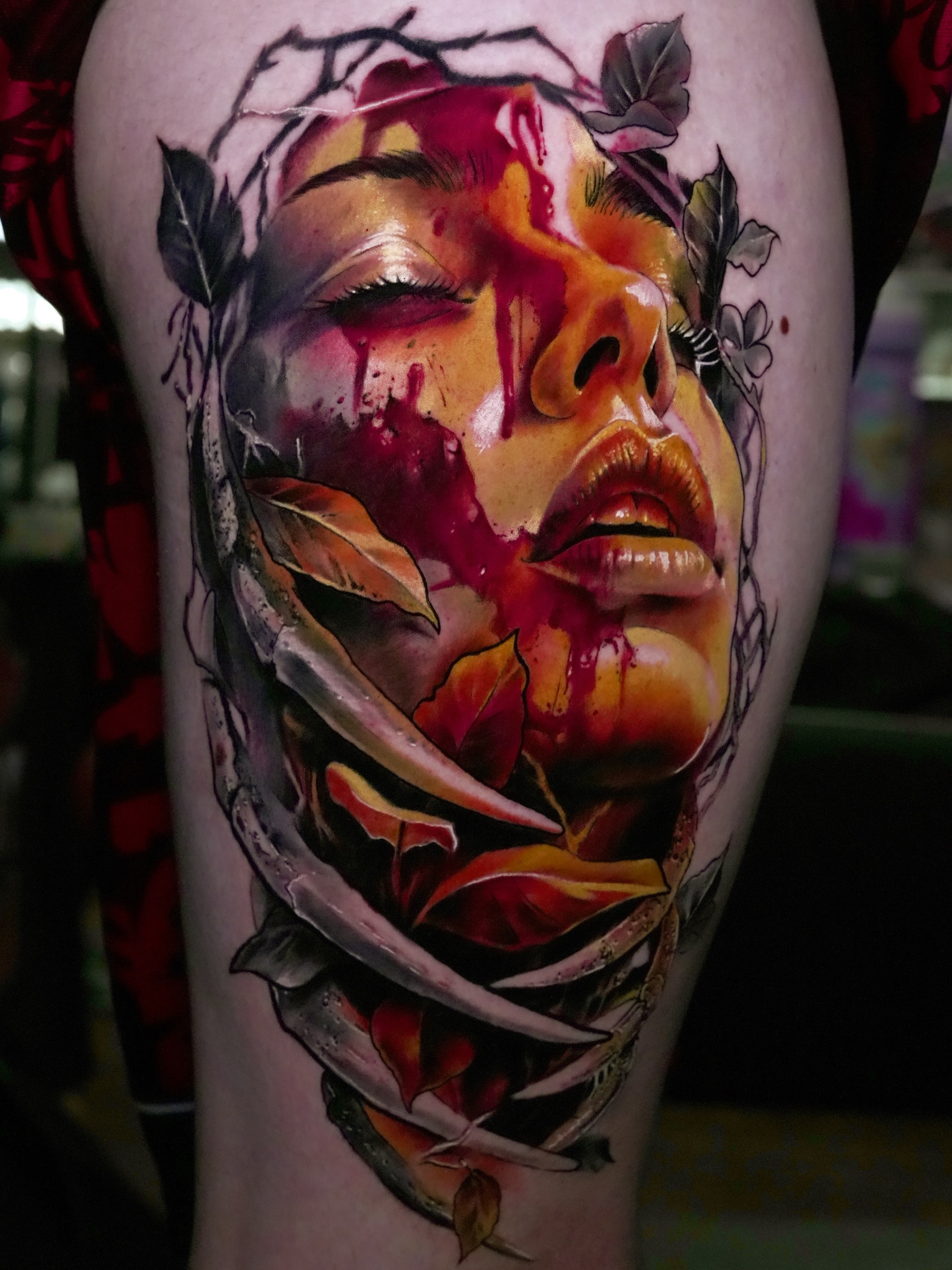 Woman's face realism tattoo on the thigh by Juan Pablo Molina