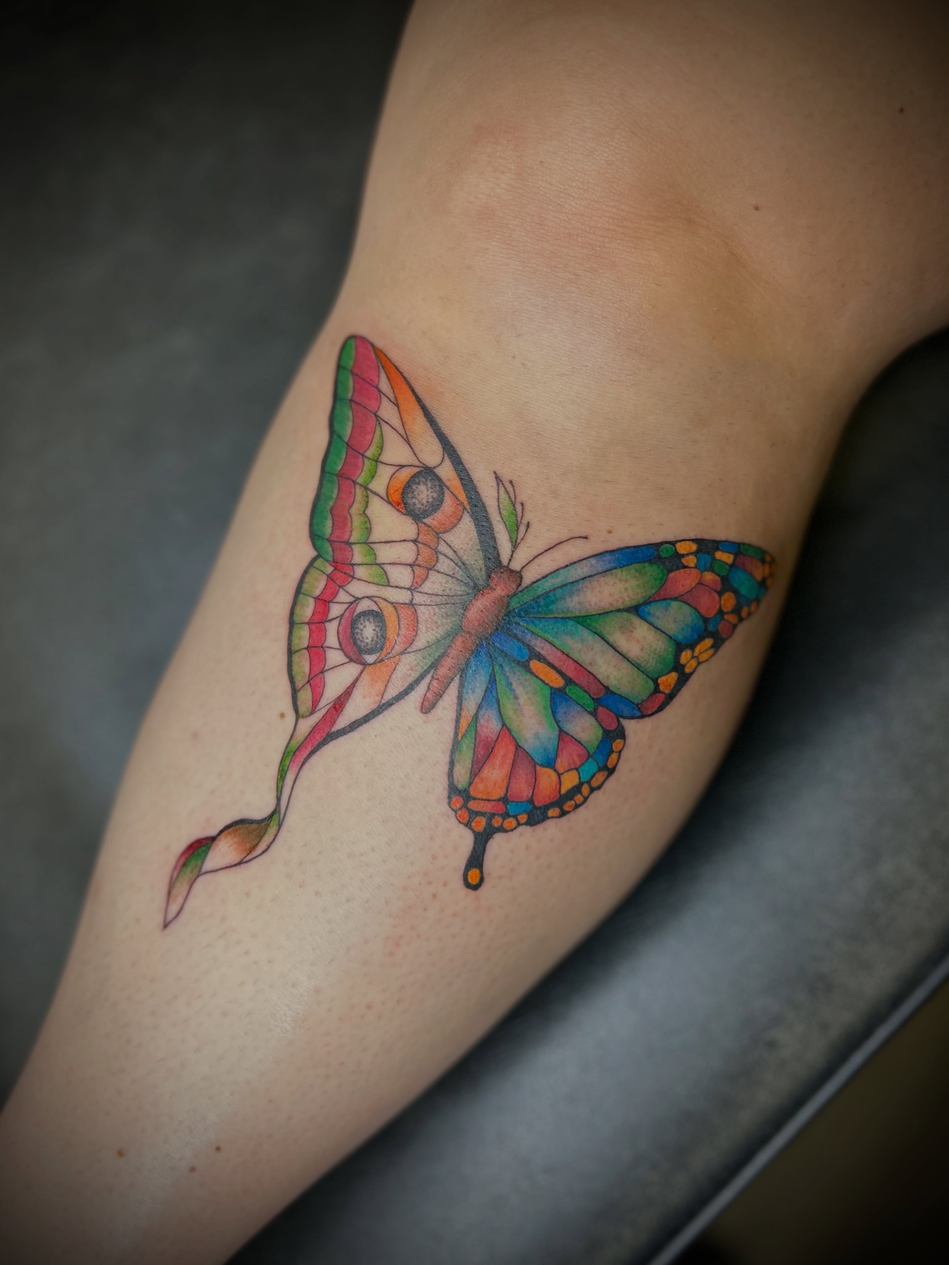 Stained glass butterfly geometric tattoo on the forearm by Browtique & Ink, Clearwater, Florida