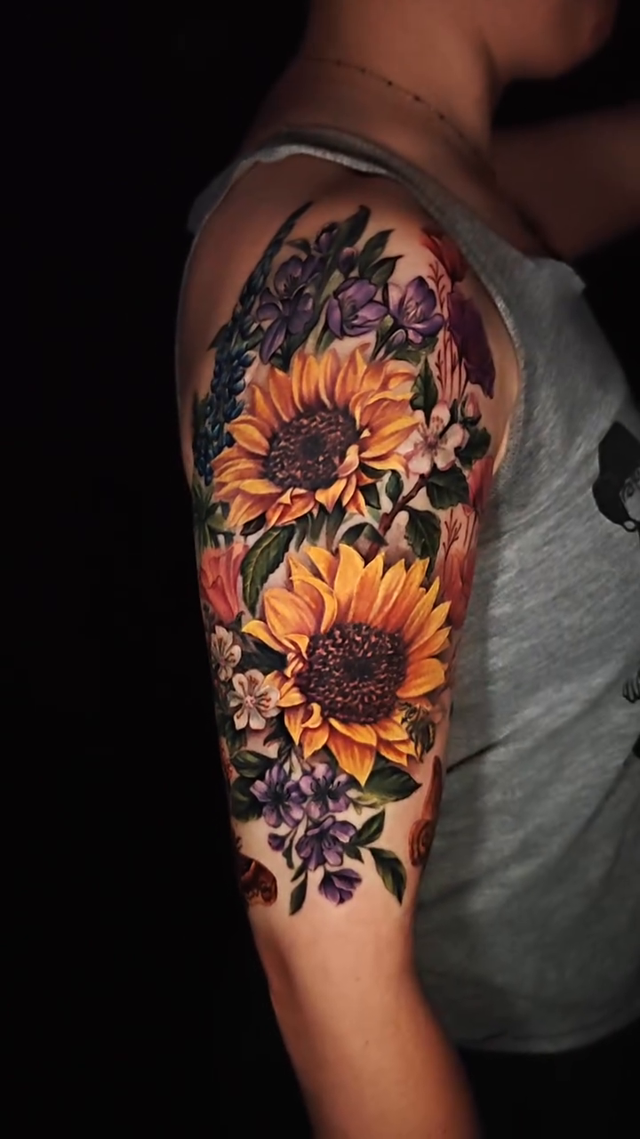 Sunflowers and wildflowers realism tattoo by Dallas Tattoo Artist Erik Espinoza