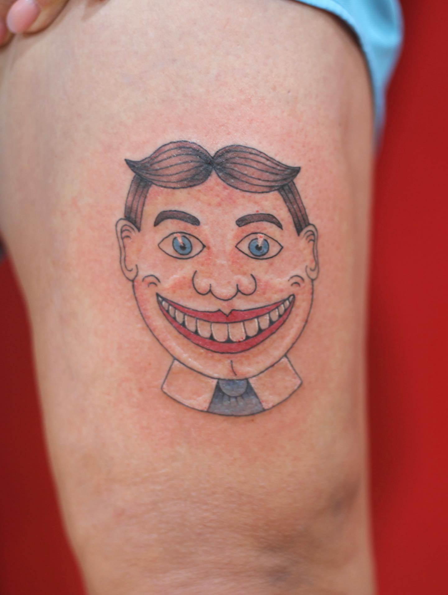 Clown face American traditional tattoo on the thigh by adrienne mae ❀