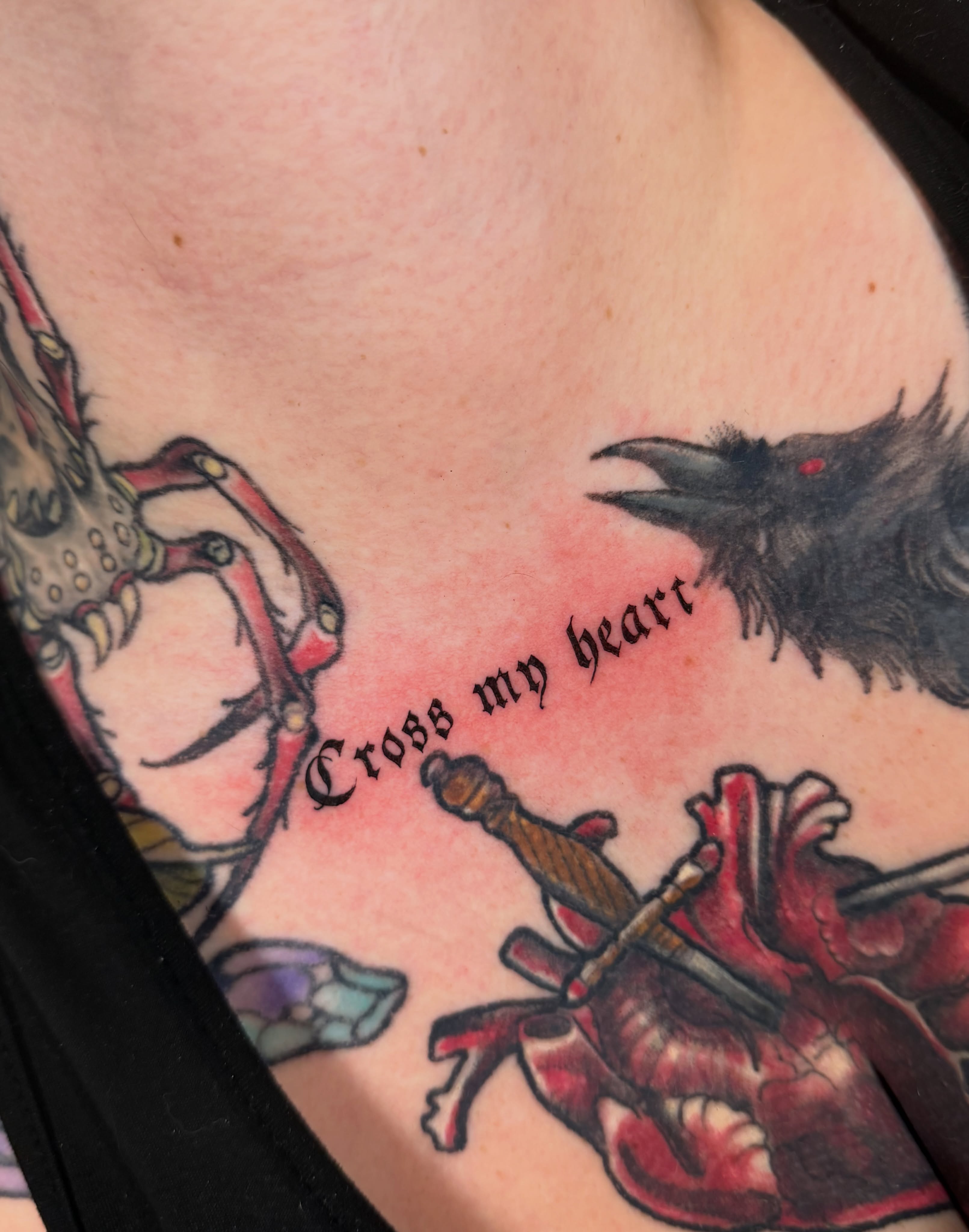 Cross my heart American traditional tattoo on the chest by Orca