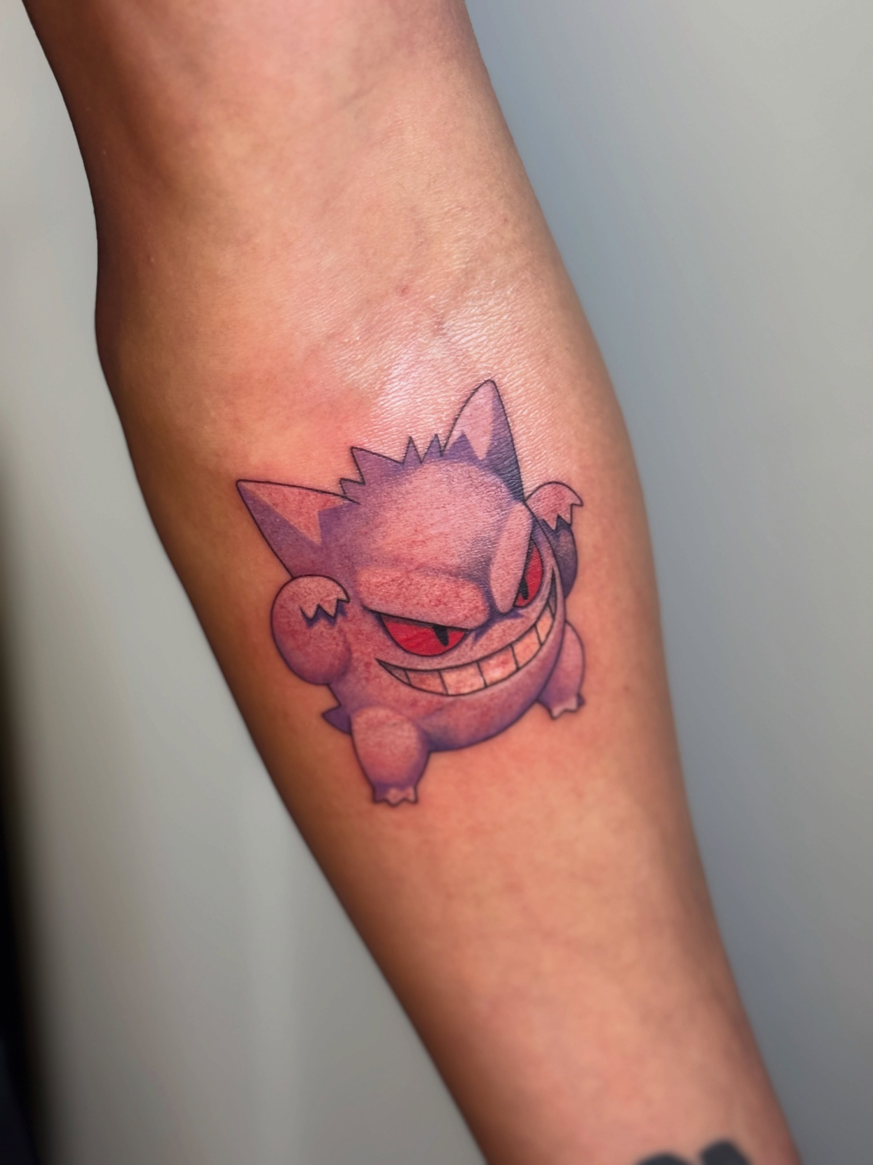 Gengar realism tattoo on the forearm by Leti