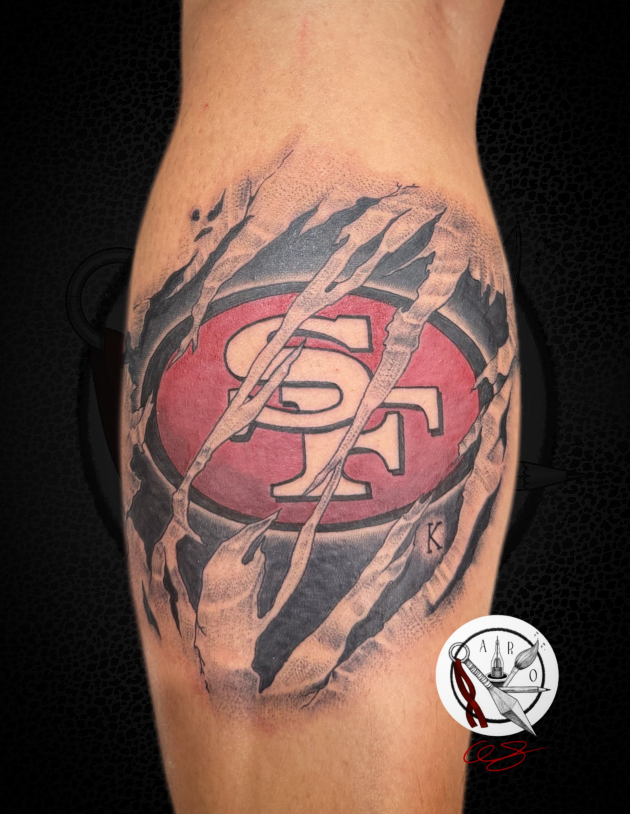 49ers logo dotwork tattoo on the forearm by Aaron Strobehn
