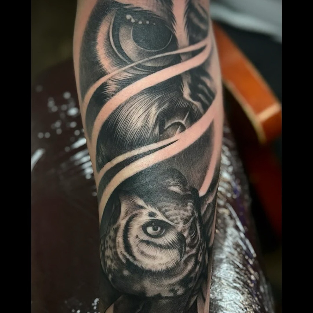 Owl realism tattoo on the forearm by Anwon Johnson