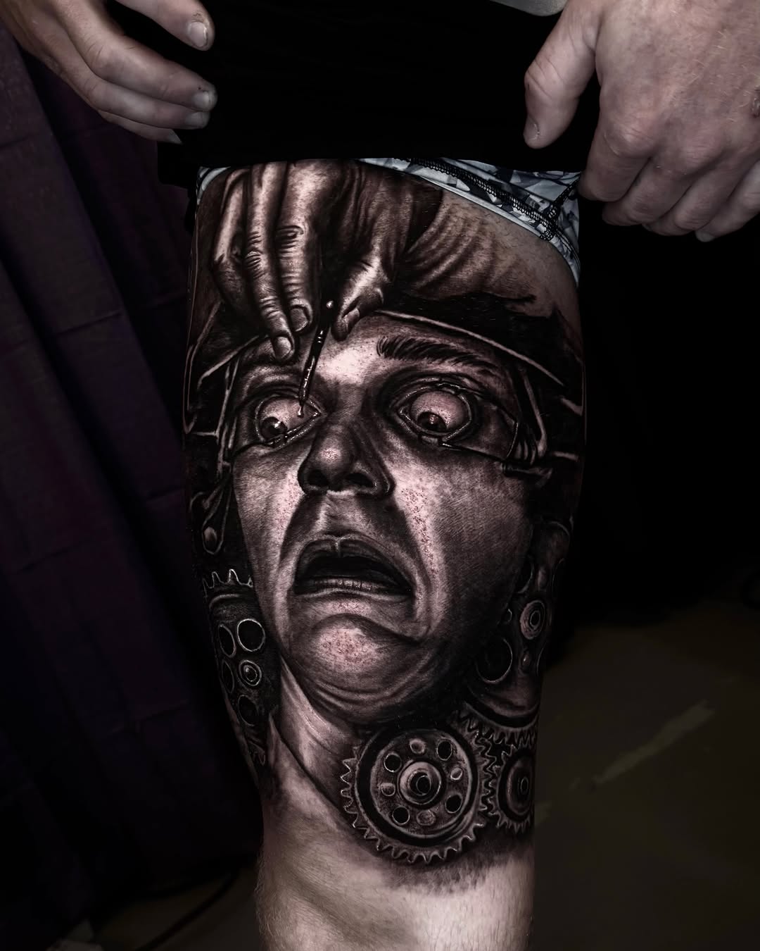 Mechanical head realism tattoo on the forearm by Trev