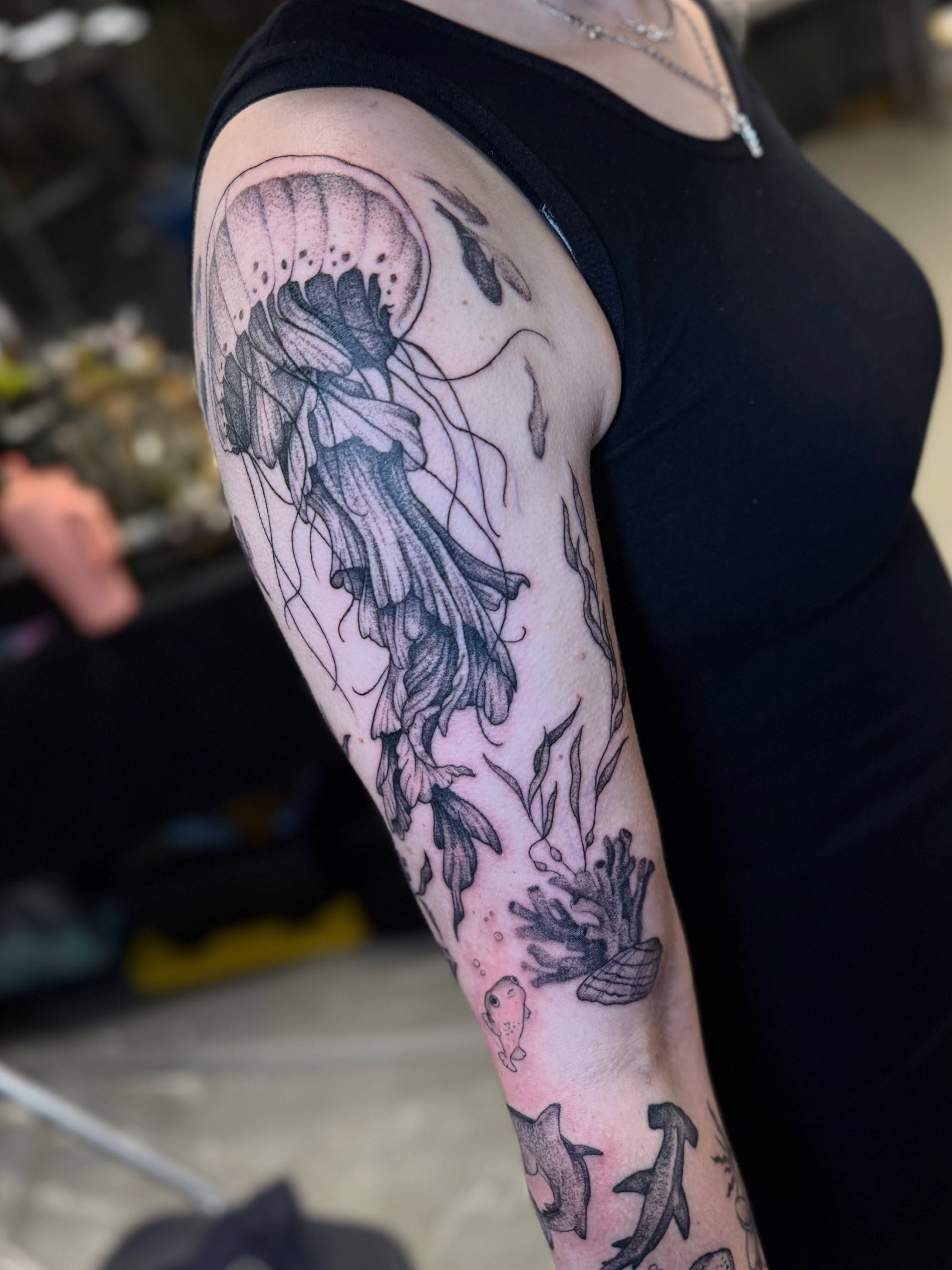 Jellyfish black and grey tattoo on the forearm by βπ¬π―π’πΆ