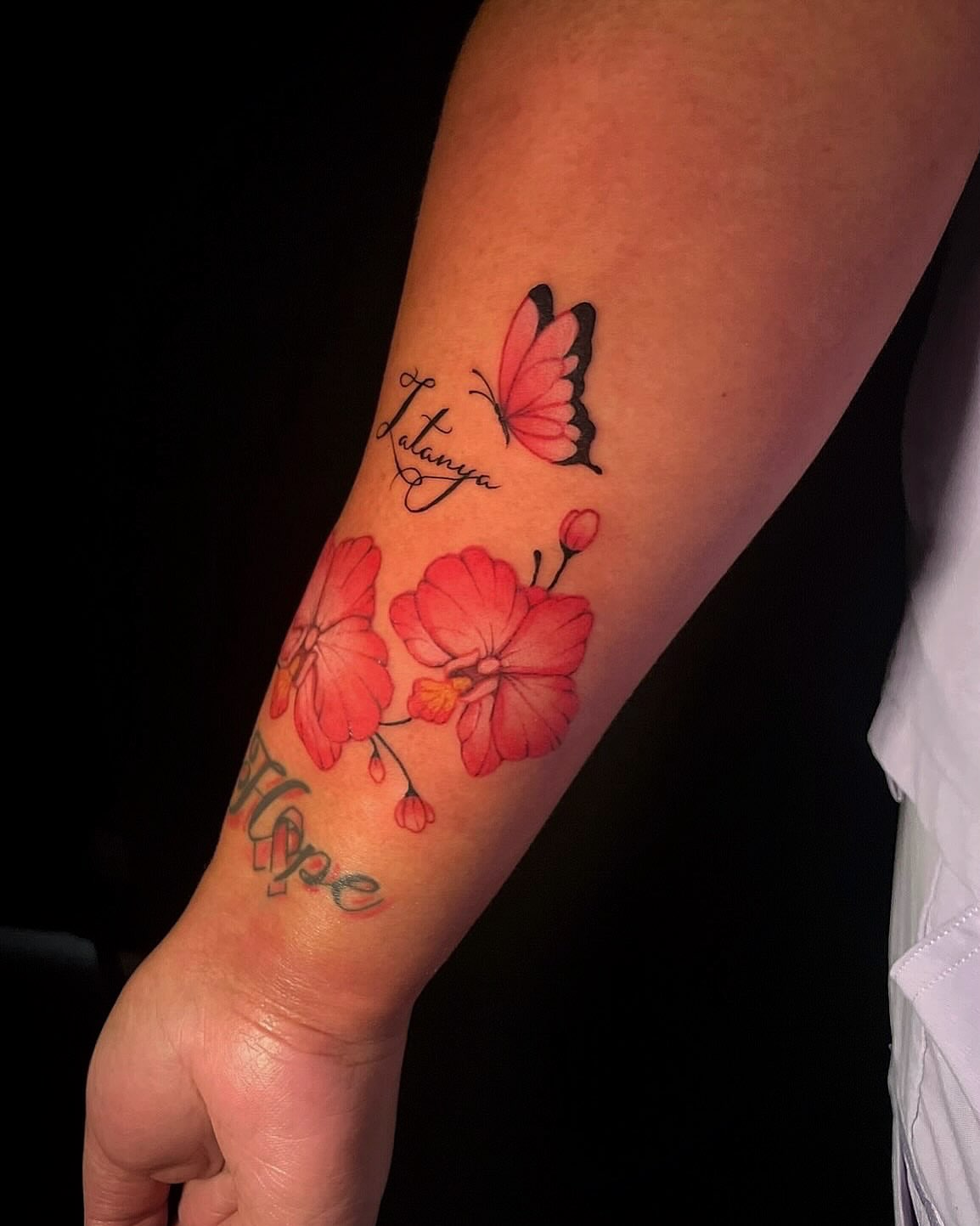 Orchids and butterfly new school tattoo on the forearm by 𝕲𝖗𝖆𝖈𝖊 🥀 ᴛᴀᴛᴛᴏᴏ