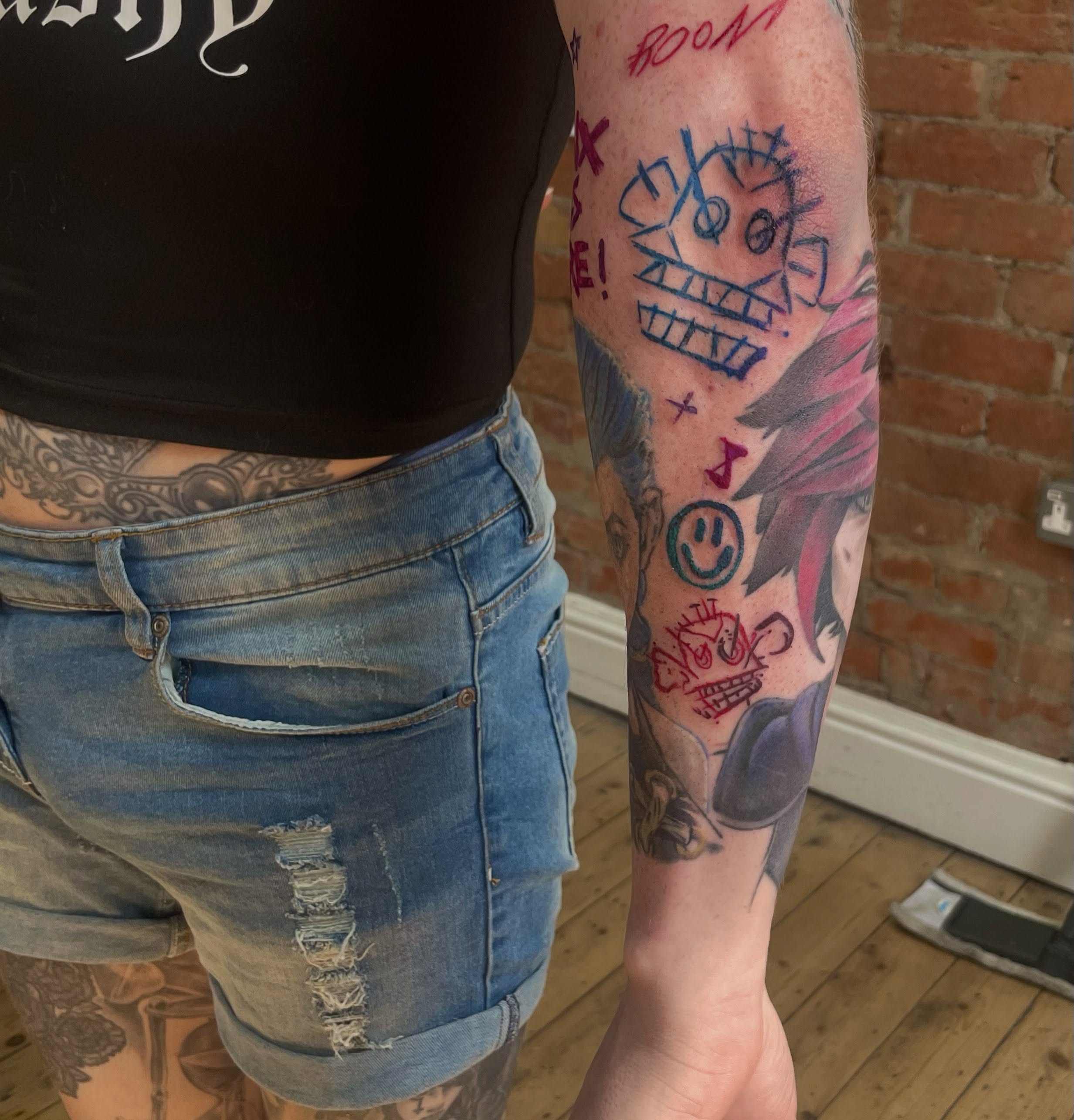 Abstract faces dotwork tattoo on the forearm by Grace derby tattooist, Derby