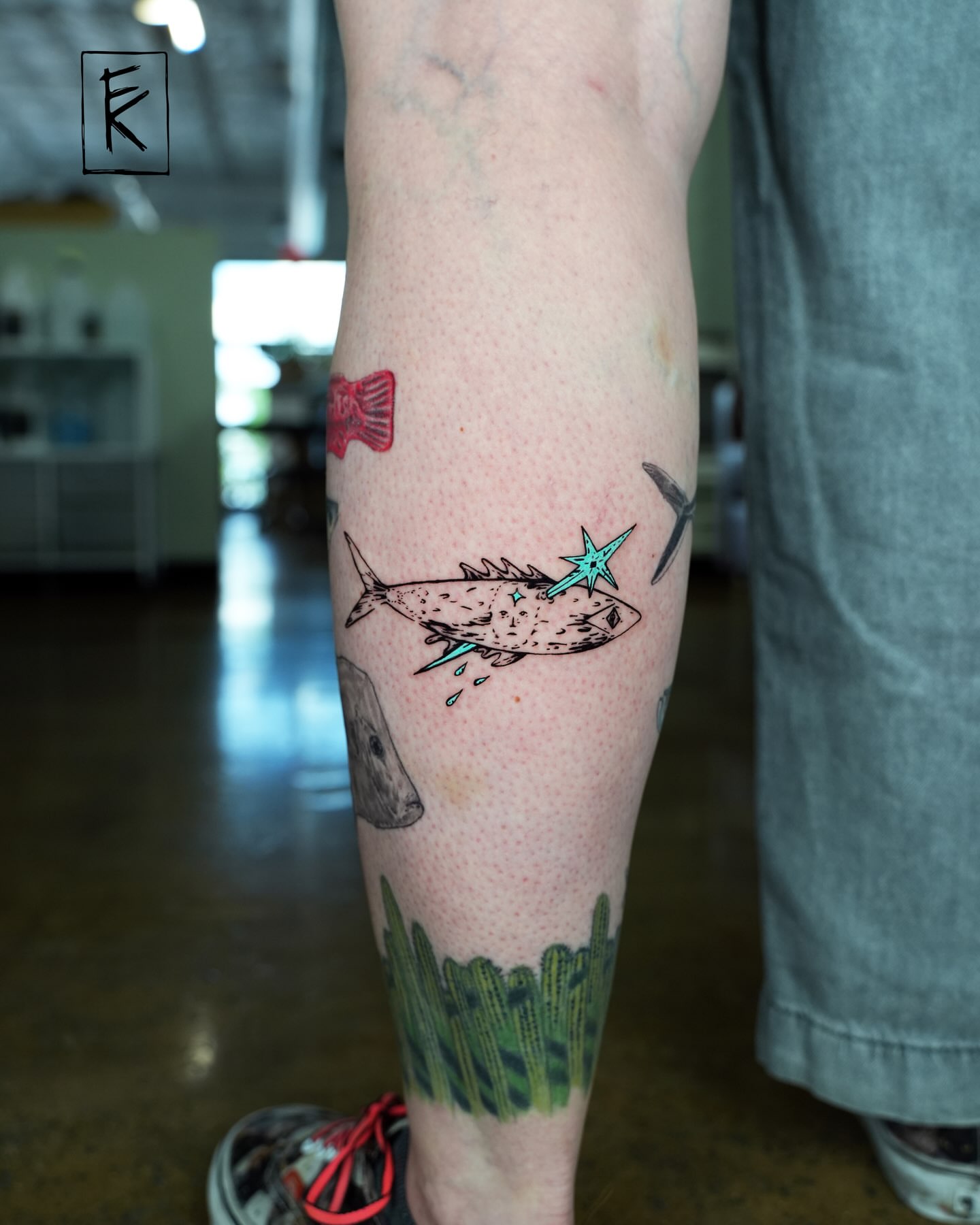 Fish dotwork tattoo on the calf by elizaveta