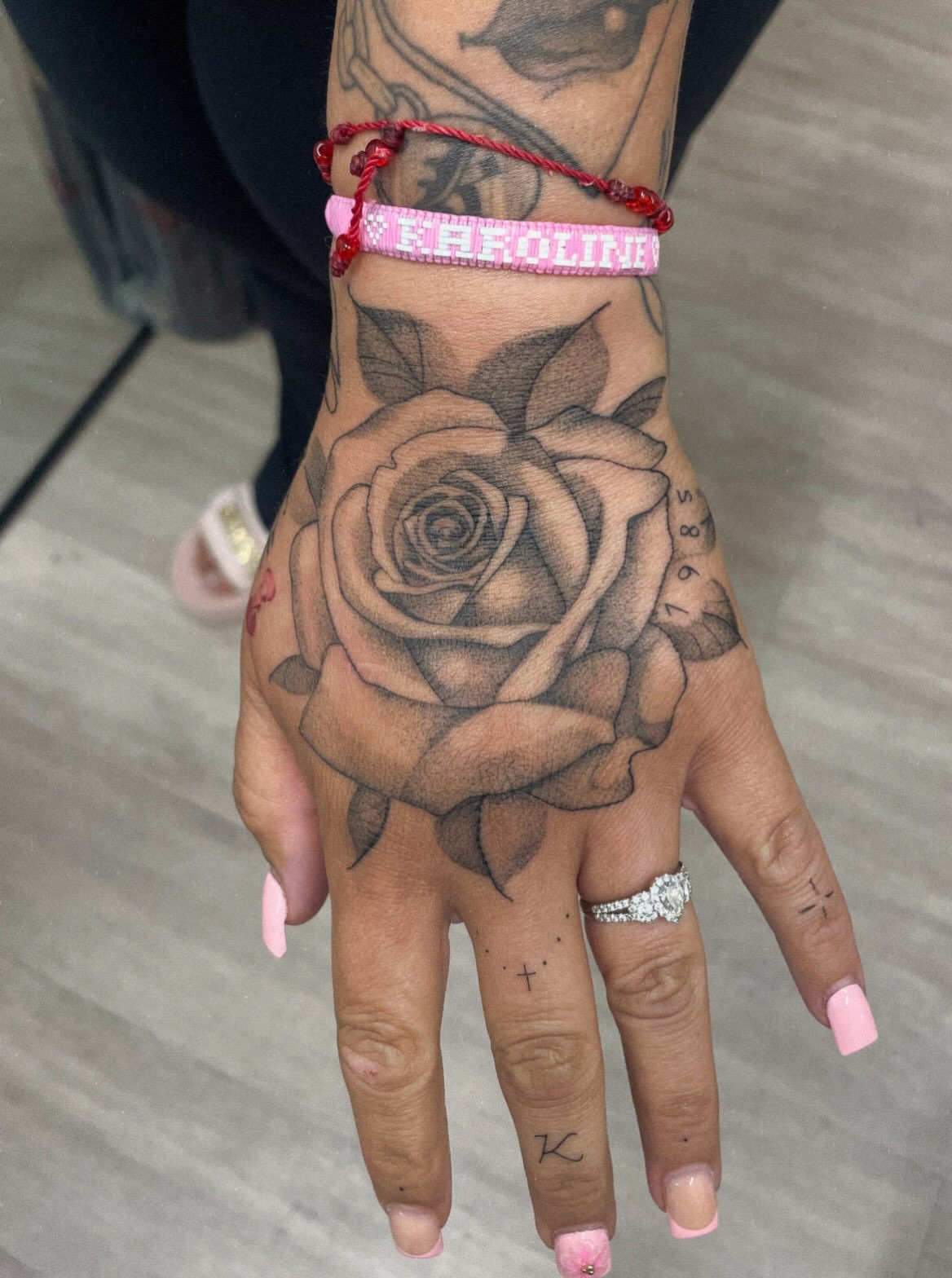 Rose realism tattoo on the hand by 𝕯𝖔𝖒