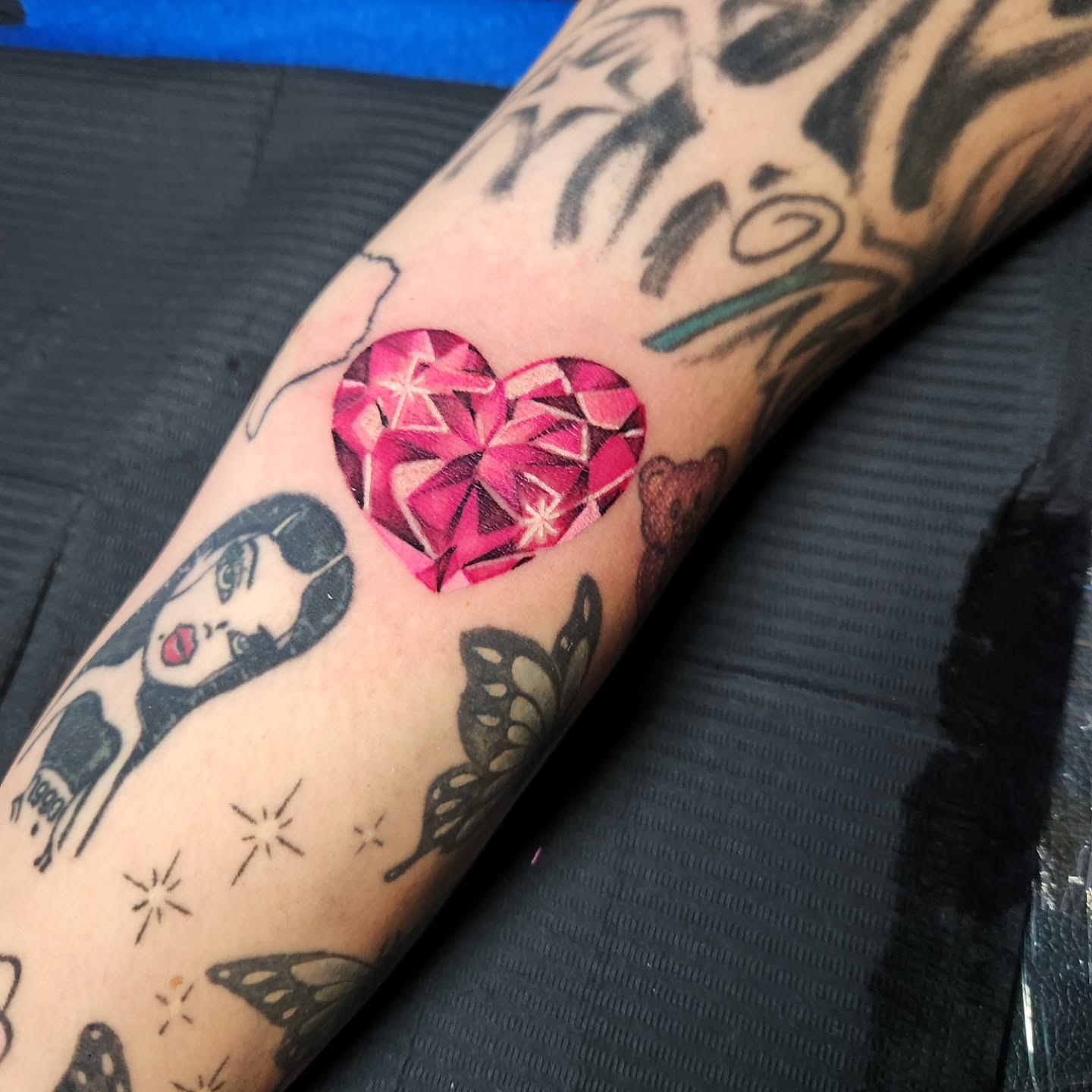 Geometric heart geometric tattoo on the forearm by Abby Renteria