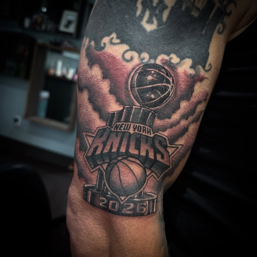 New york knicks black and grey tattoo on the forearm by Cory Haberman
