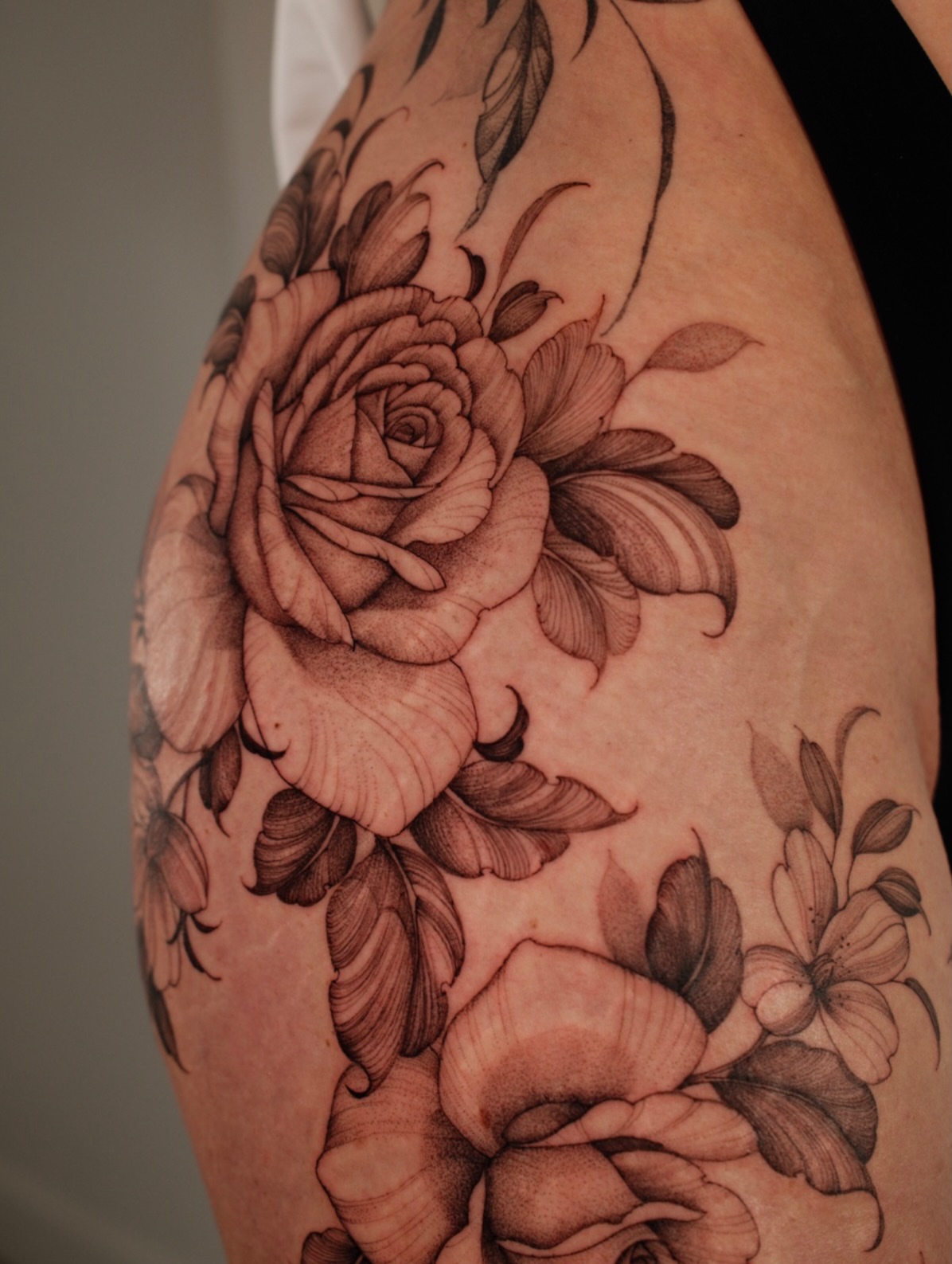 Floral bouquet realism tattoo on the thigh by LORIE π€ Floral Tattoo Artist, Los Angeles, California