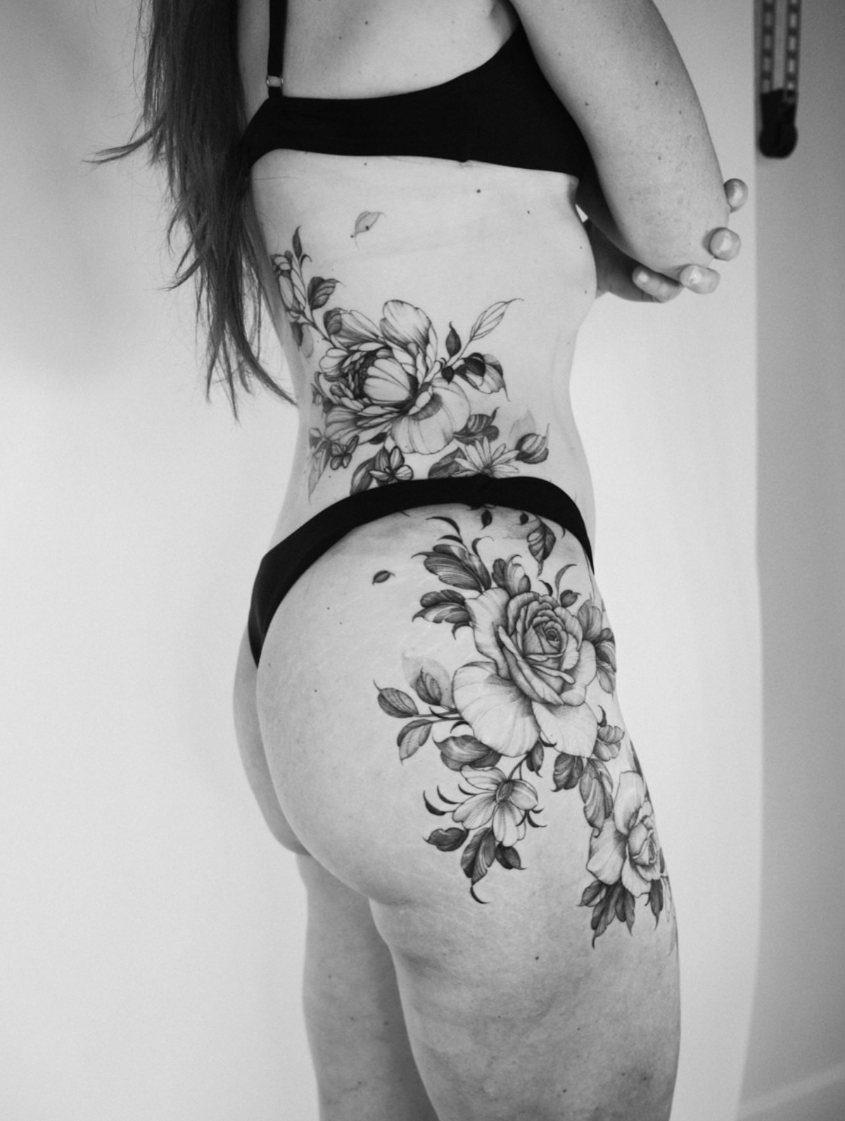 Floral bouquet black and grey tattoo on the thigh by LORIE π€ Floral Tattoo Artist, Los Angeles, California