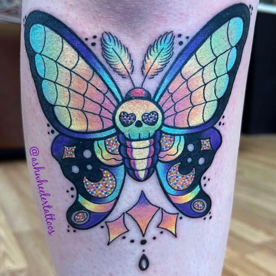 Butterfly skull dotwork tattoo on the forearm by Ash Wheeler