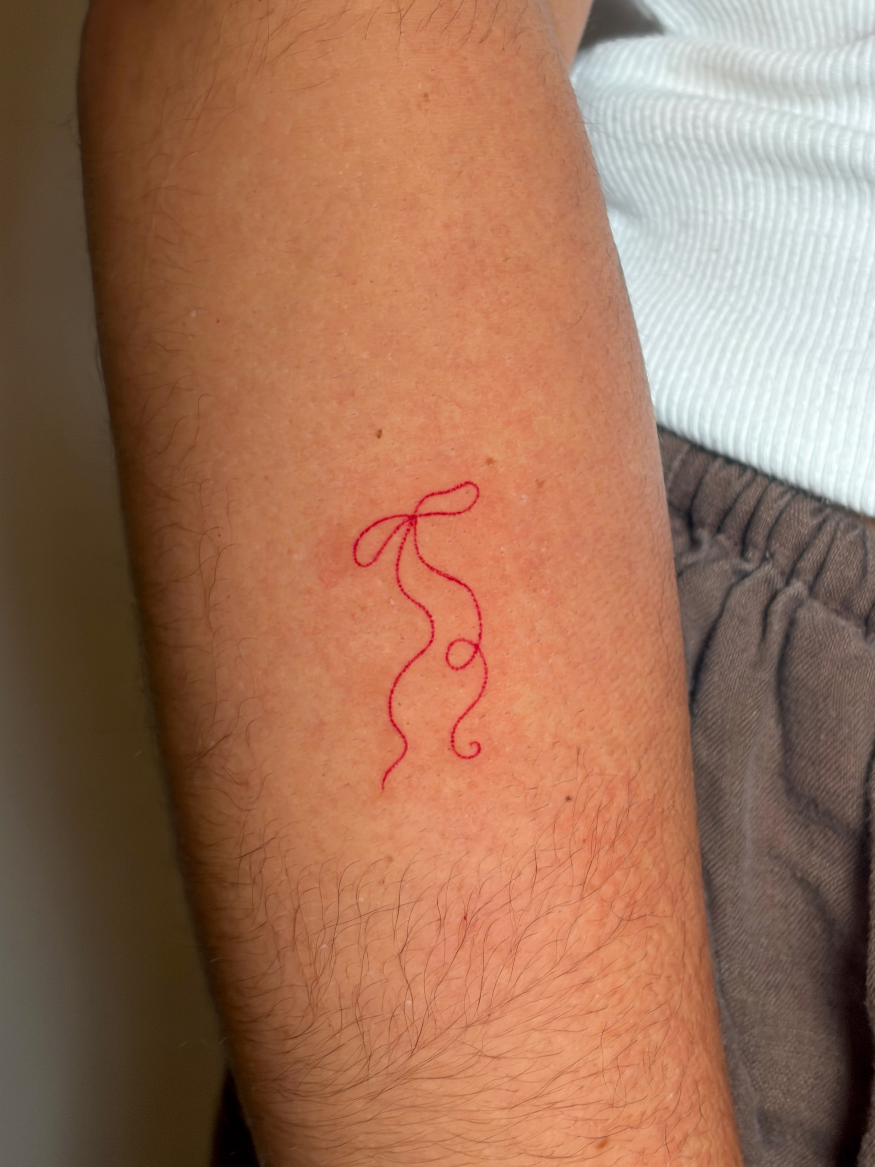 String fine line tattoo on the forearm by alli ミ☆