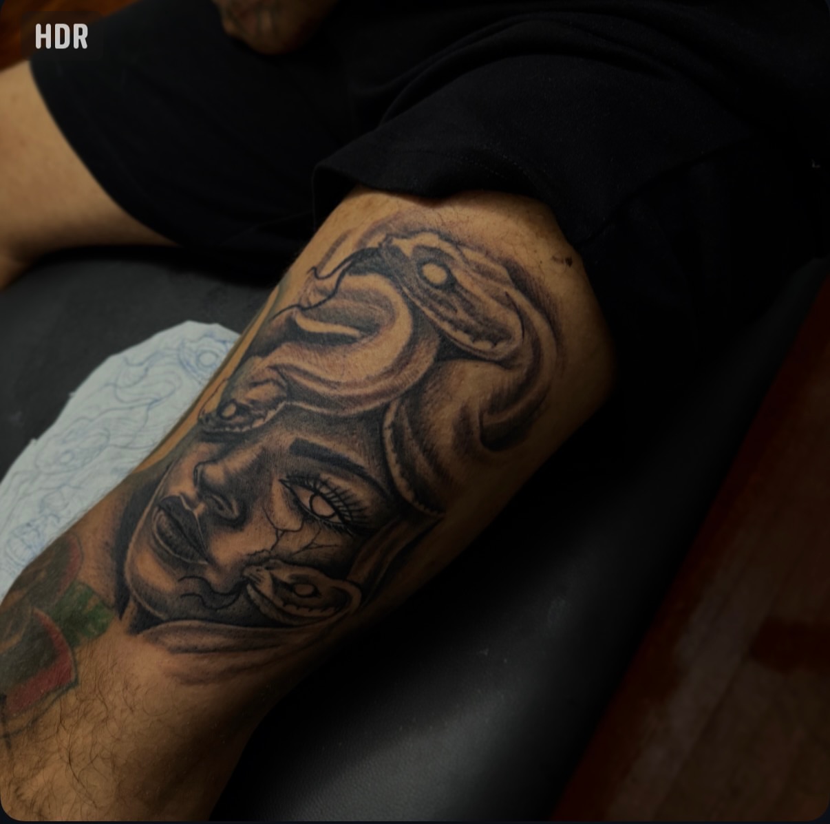 Mask black and grey tattoo on the forearm by Lamb, Philadelphia, Pennsylvania