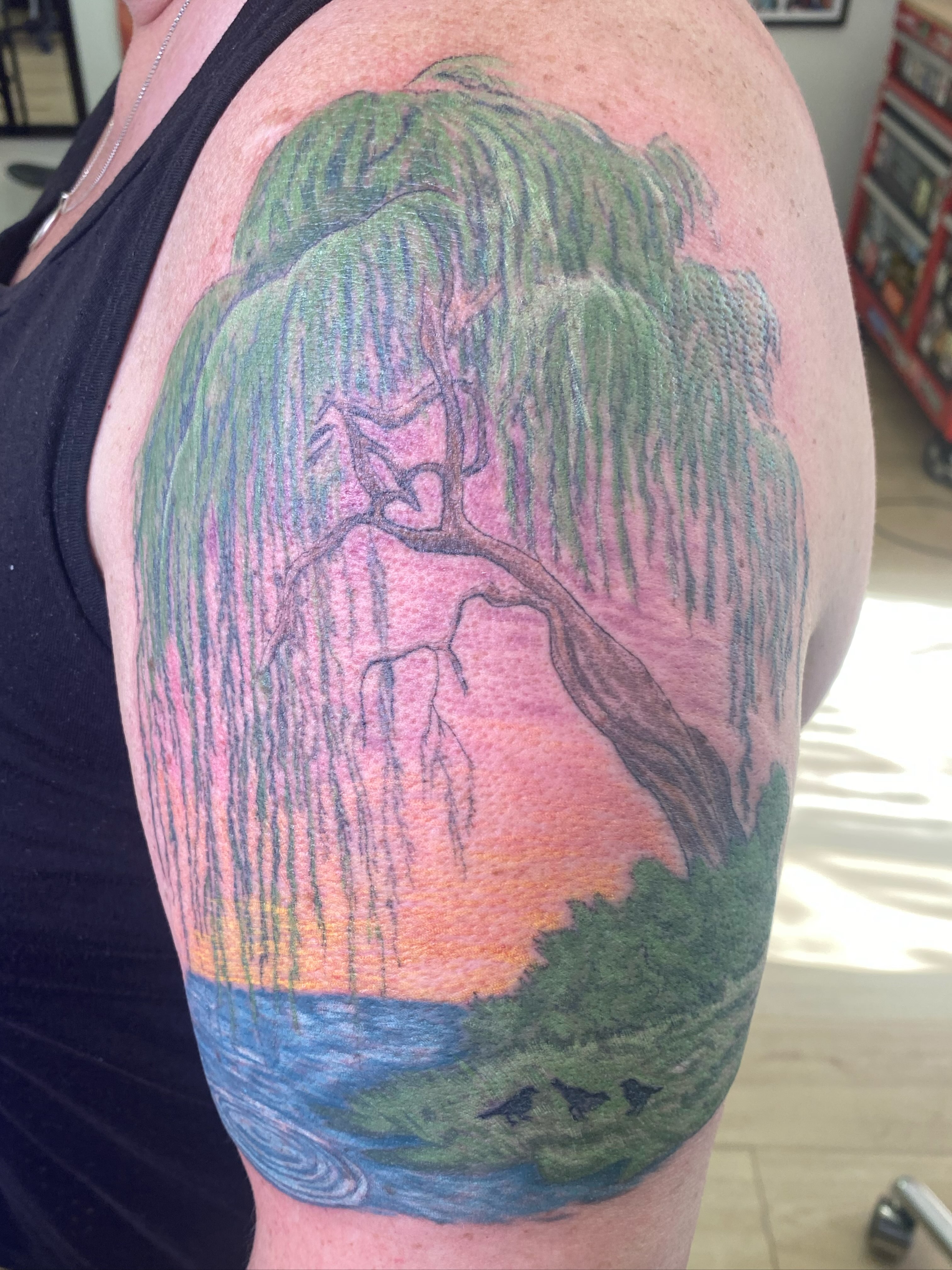 Weeping willow tree realism tattoo on the upper arm by Katie Leeper