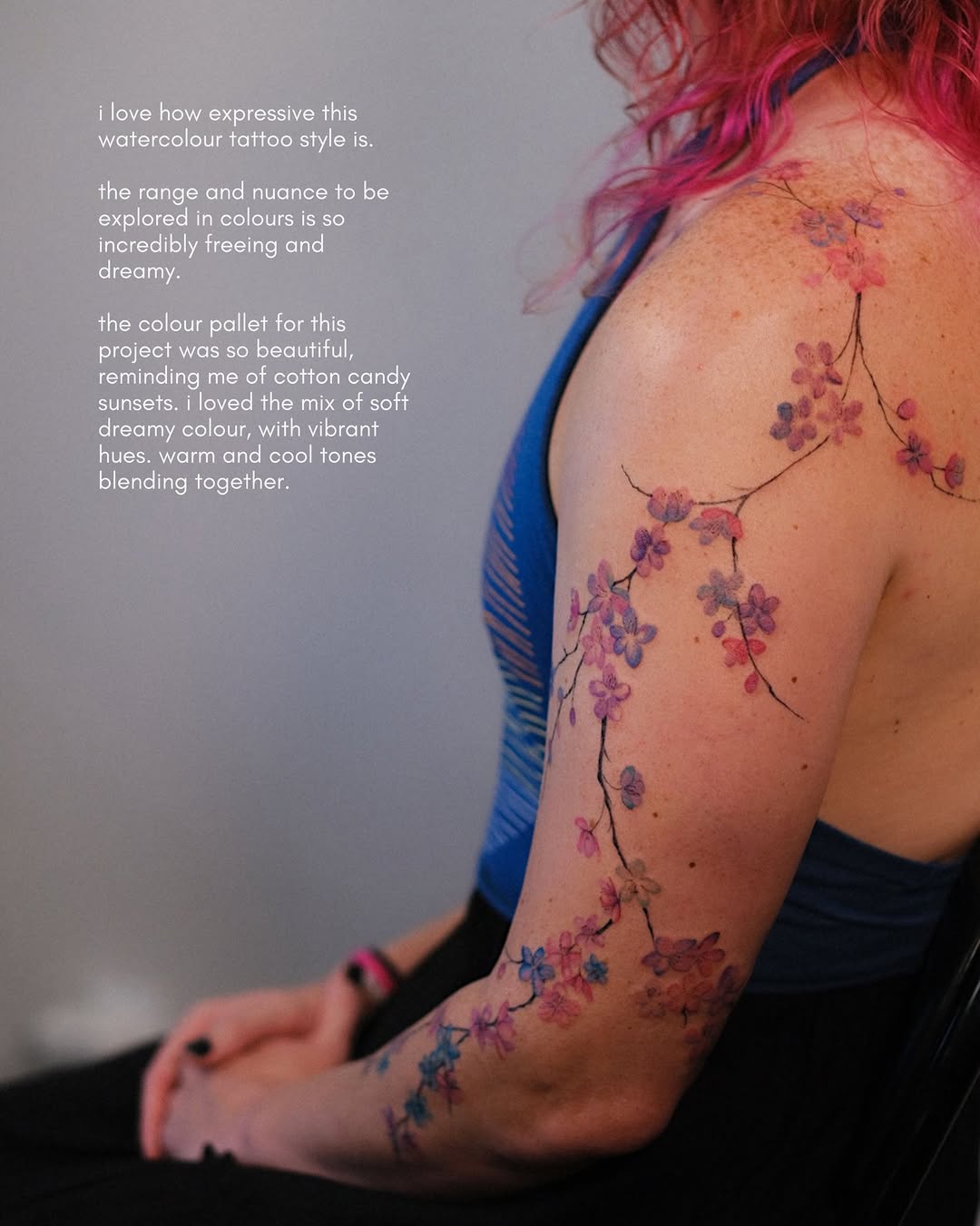 Cherry blossoms watercolor tattoo on the upper arm by Temple Adorned Tattoo