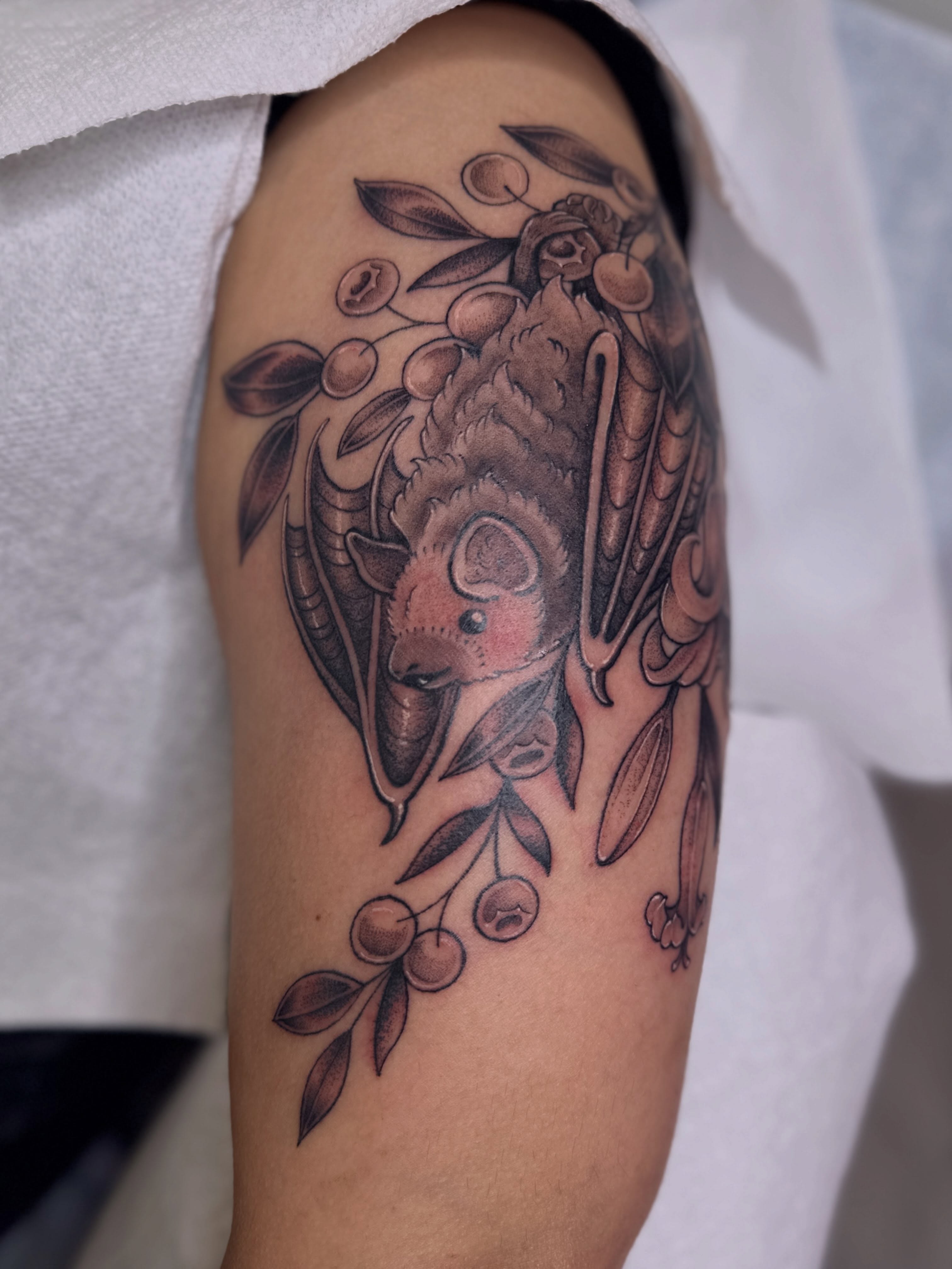 Koala and eucalyptus realism tattoo on the forearm by Dani Di Pietrantonio