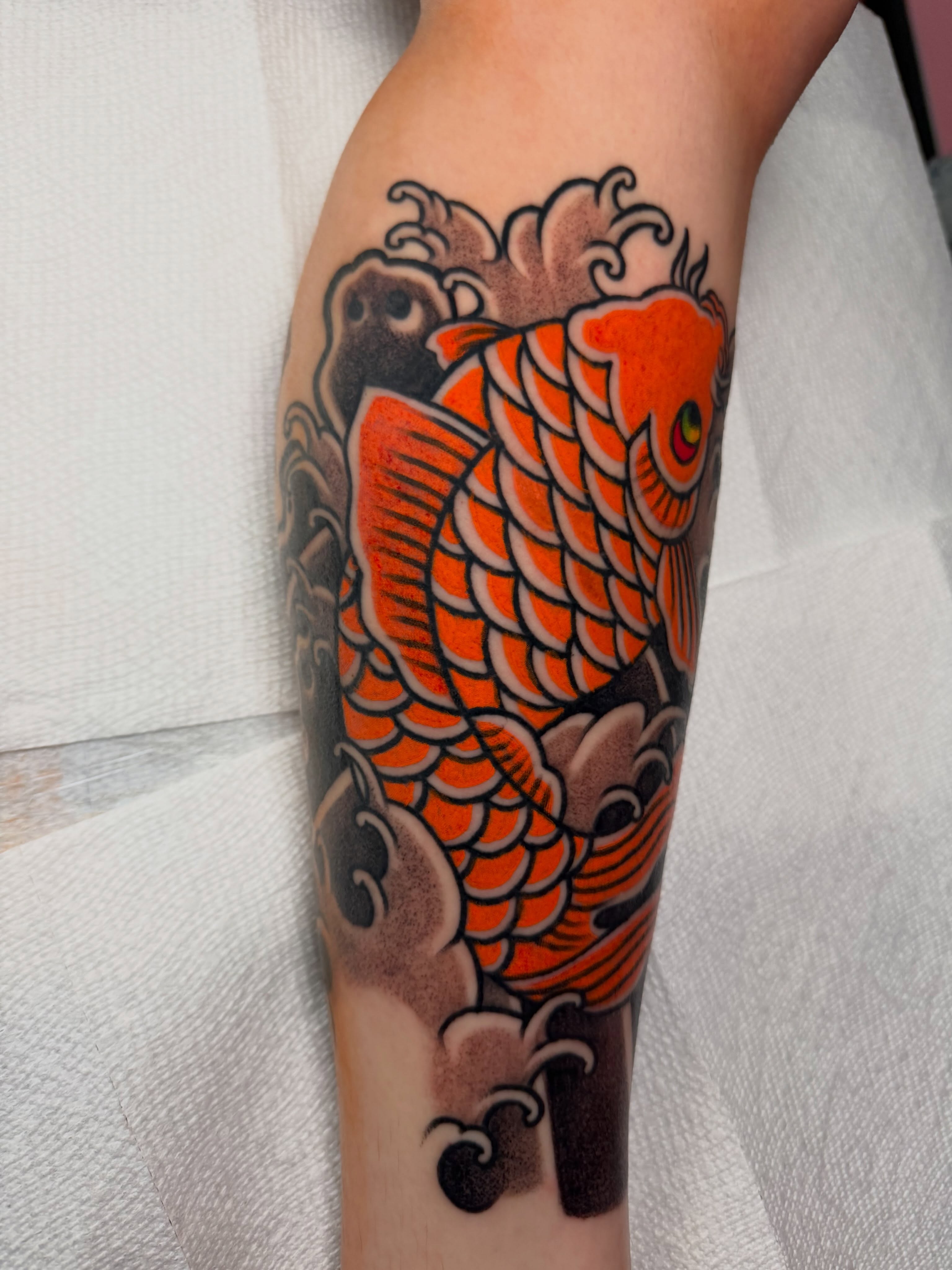 Koi fish japanese irezumi tattoo on the forearm by Don Lee