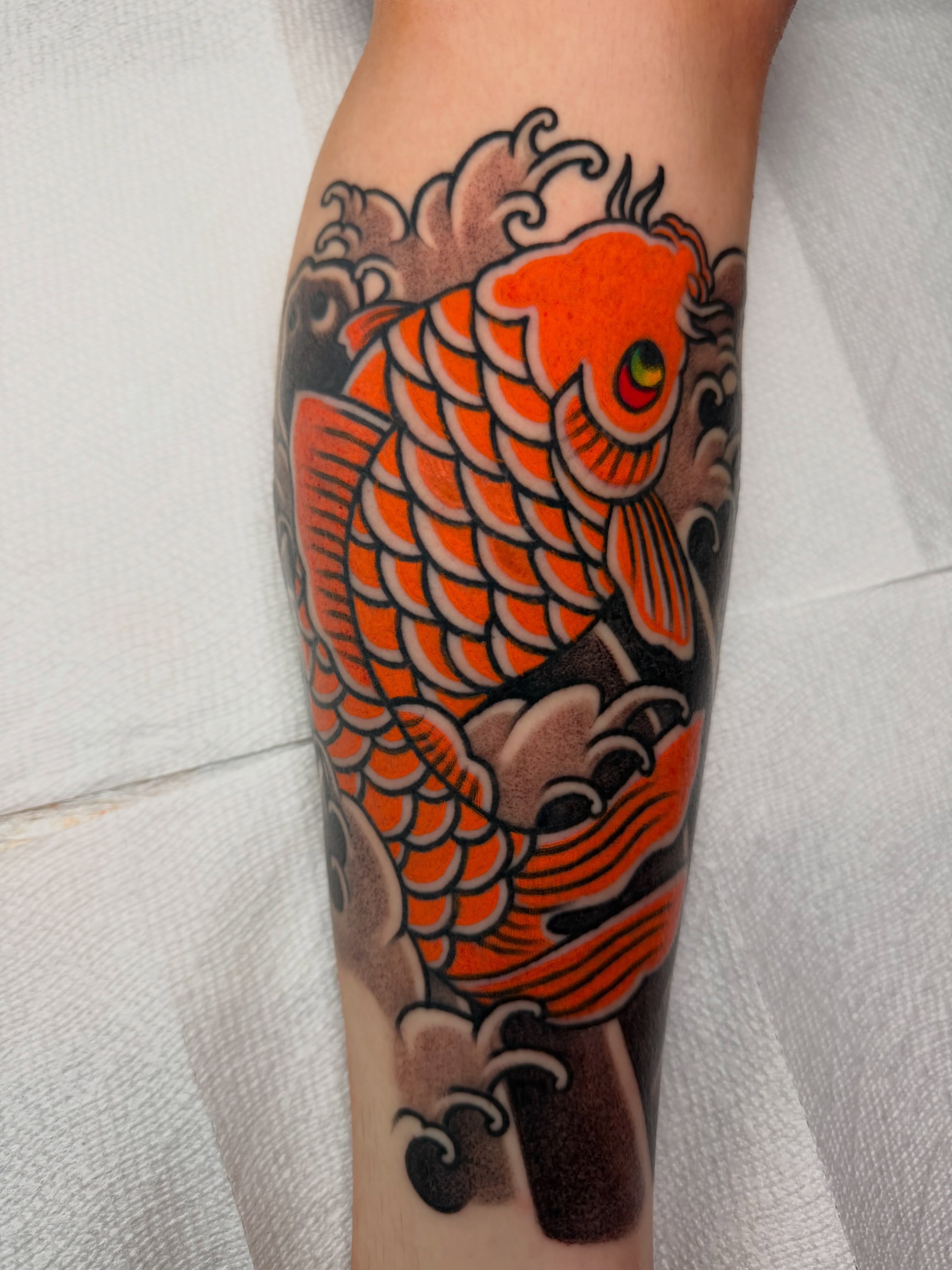 Koi fish japanese irezumi tattoo on the forearm by Don Lee